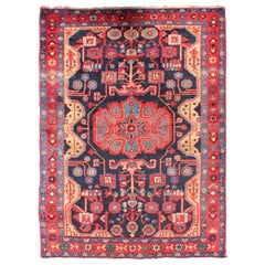 Vintage Persian Nahavand Rug with Geometric Medallion Design in Red and Blue