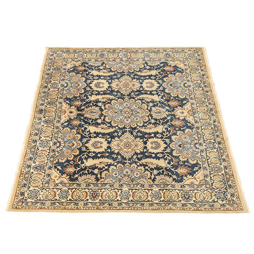 Vintage Persian rug handwoven from the finest sheep’s wool and colored with all-natural vegetable dyes that are safe for humans and pets. It’s a traditional Nain design featuring a blue and brown floral motifs over a navy and beige field. It’s an
