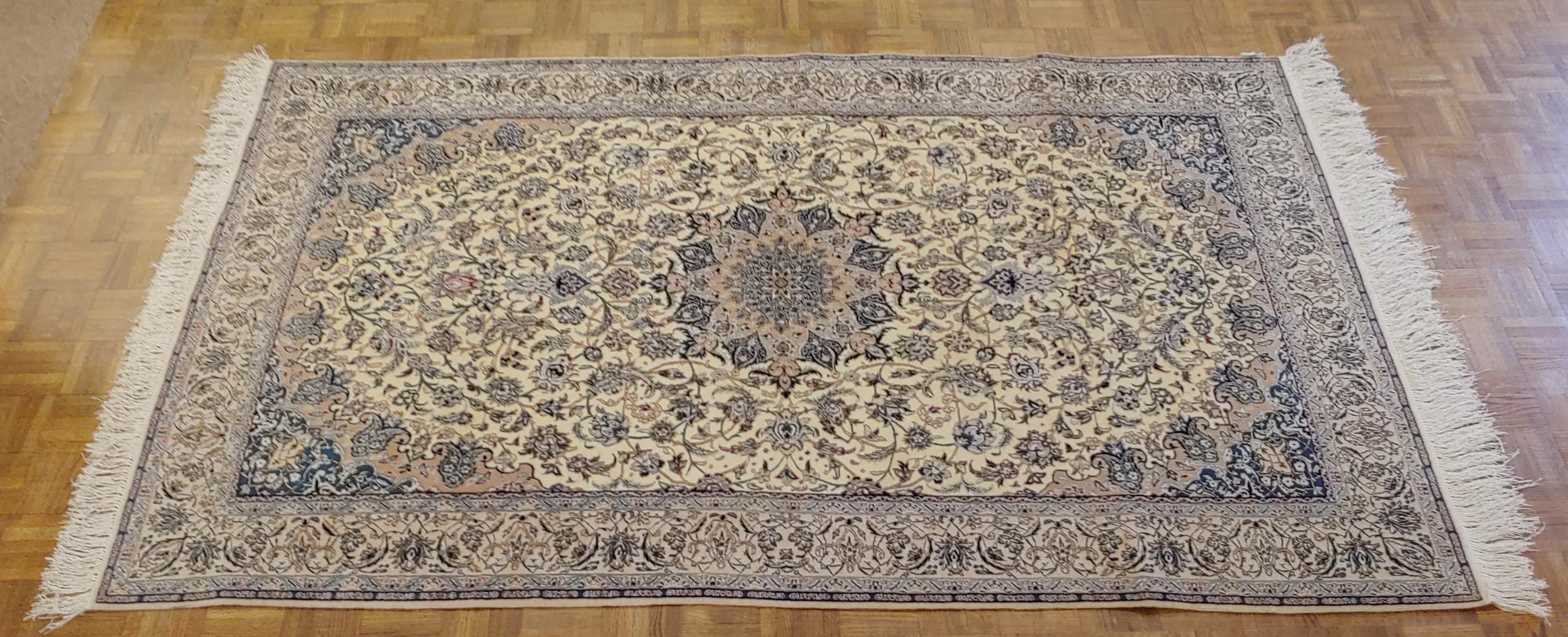 Extraordinary and very fine Persian Nain rug. Nain are known as one of the finest rugs woven in Persia. This particular rug has approximately 700 knots per square inch (kpsi). It is a wool pile with silk highlights woven on linen. It uses the