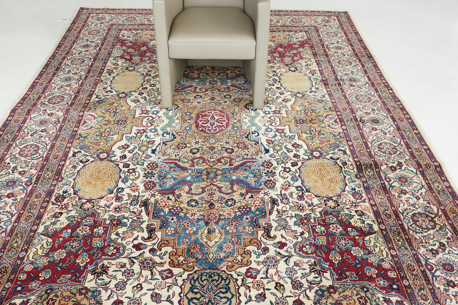 A grand and stunning piece indeed, this rug features a marvelous floral pattern along with large intricate motifs in the center. The border continues with the captivating pattern featuring a repeating pattern of large floral motifs.

Rug number