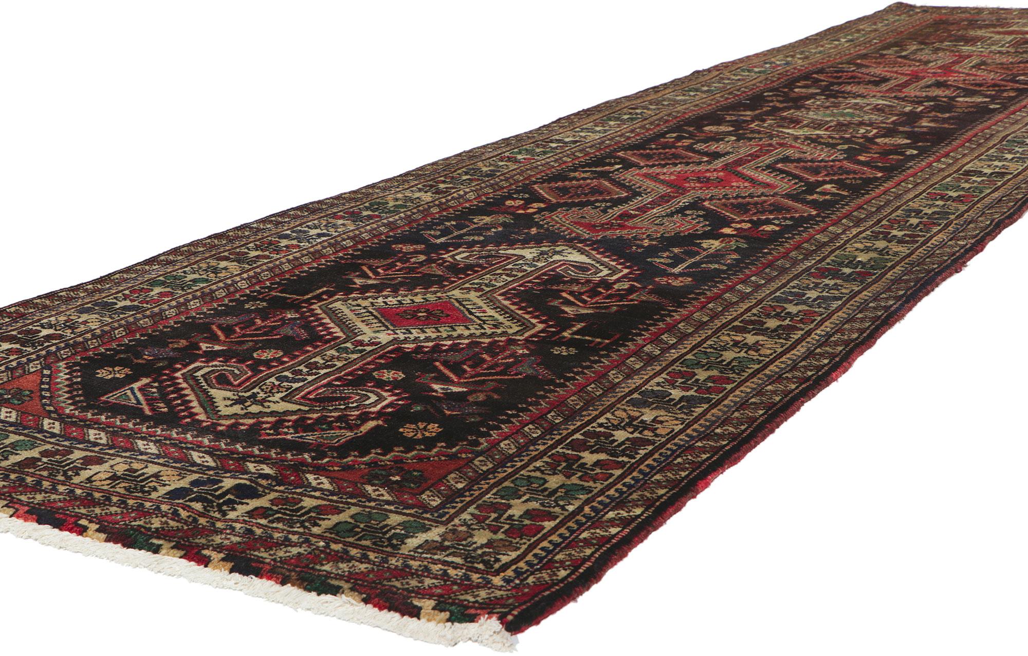 61048 vintage Persian Northwest rug Runner with Tribal style, 03'07 x 13'10. Full of tiny details and a bold expressive design combined with tribal style, this hand-knotted wool vintage Persian Northwest runner is a captivating vision of woven