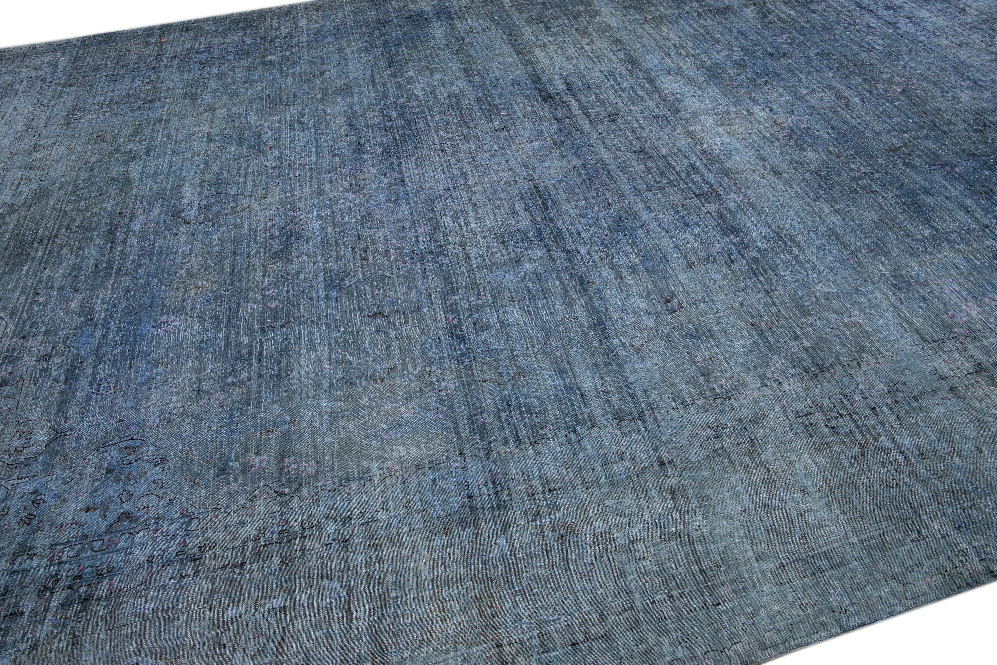 20th Century Vintage Persian Overdyed Handmade Blue Wool Rug For Sale