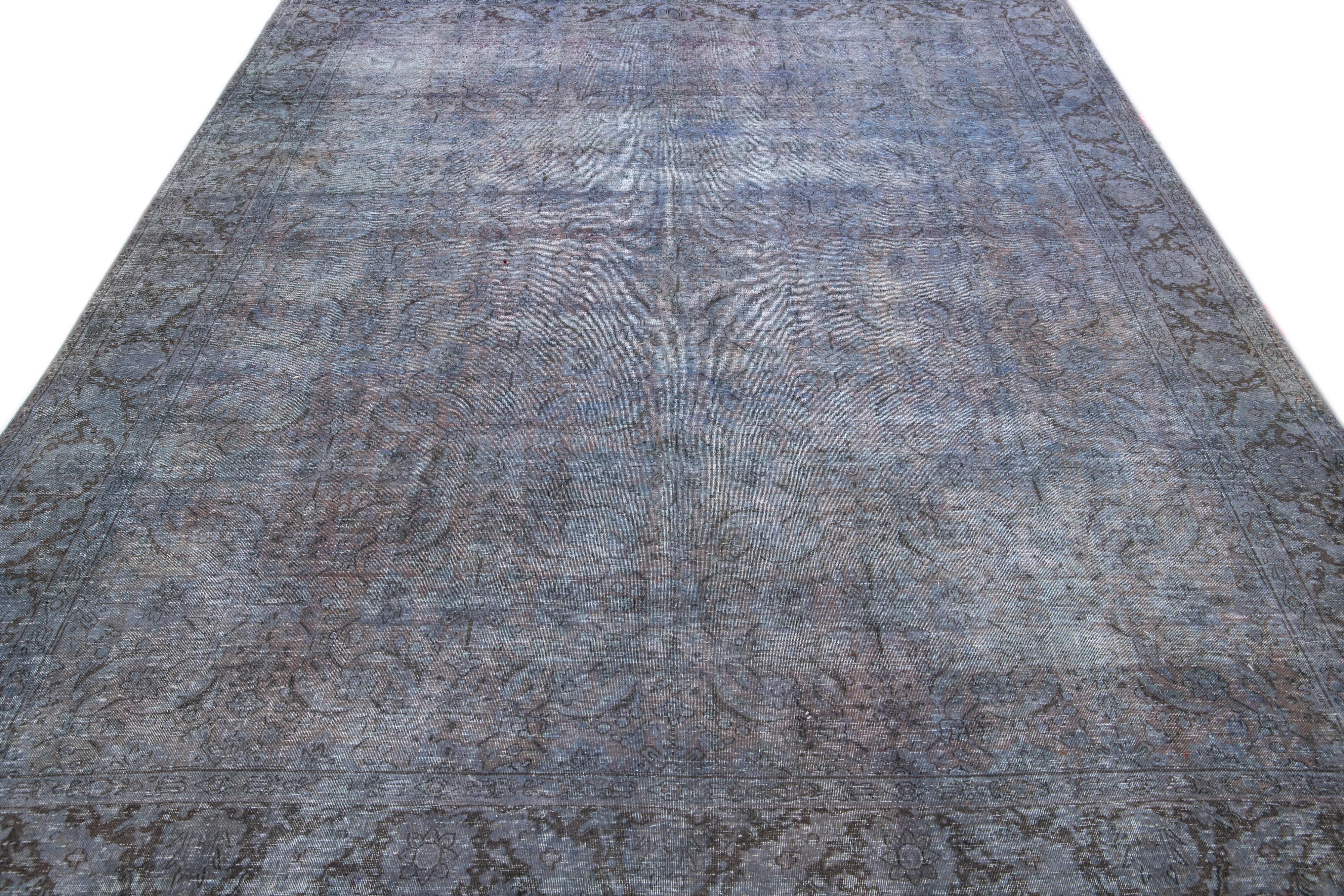 Islamic Vintage Persian Overdyed Handmade Floral Blue Wool Rug For Sale