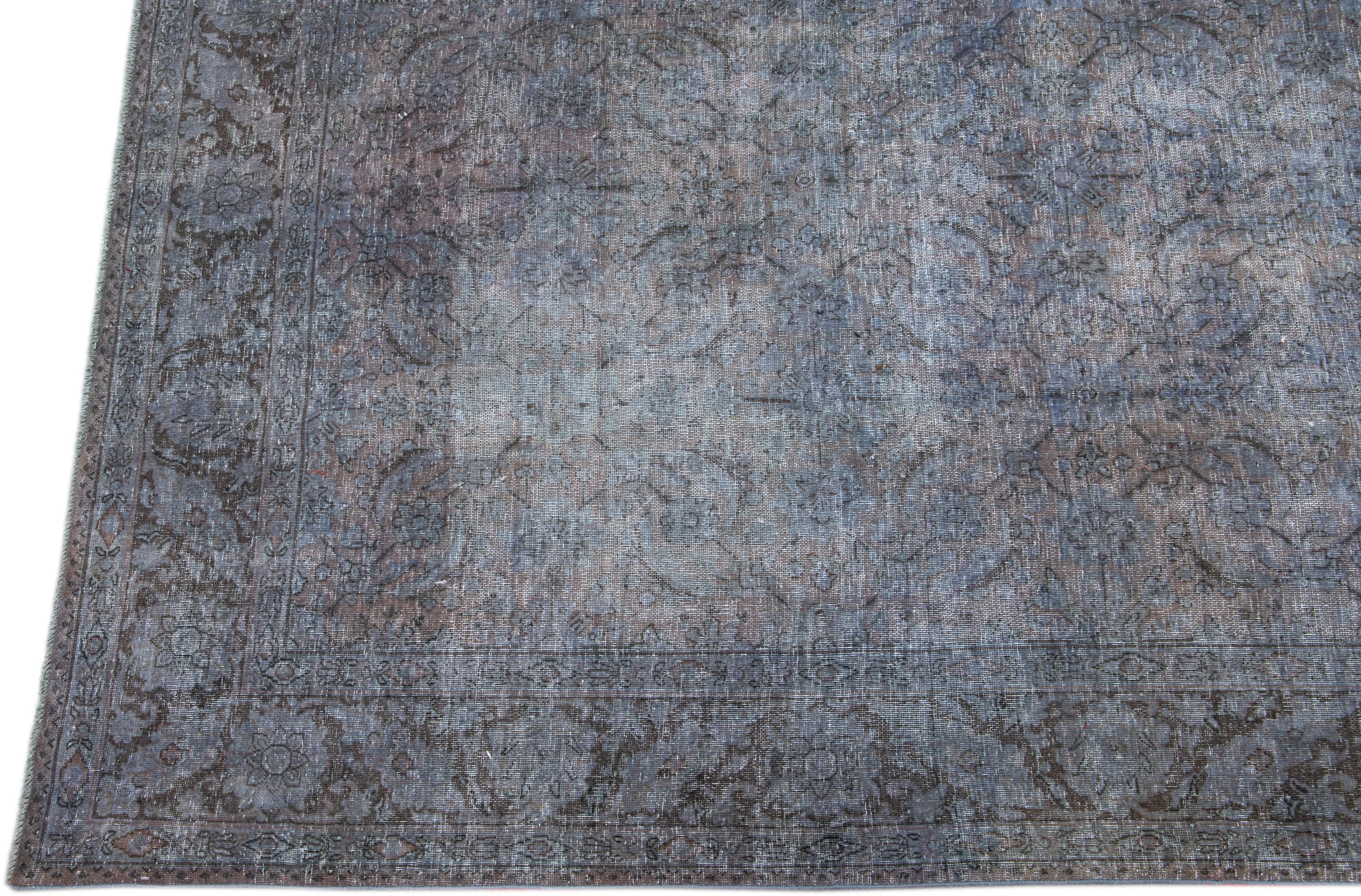 Vintage Persian Overdyed Handmade Floral Blue Wool Rug For Sale 1