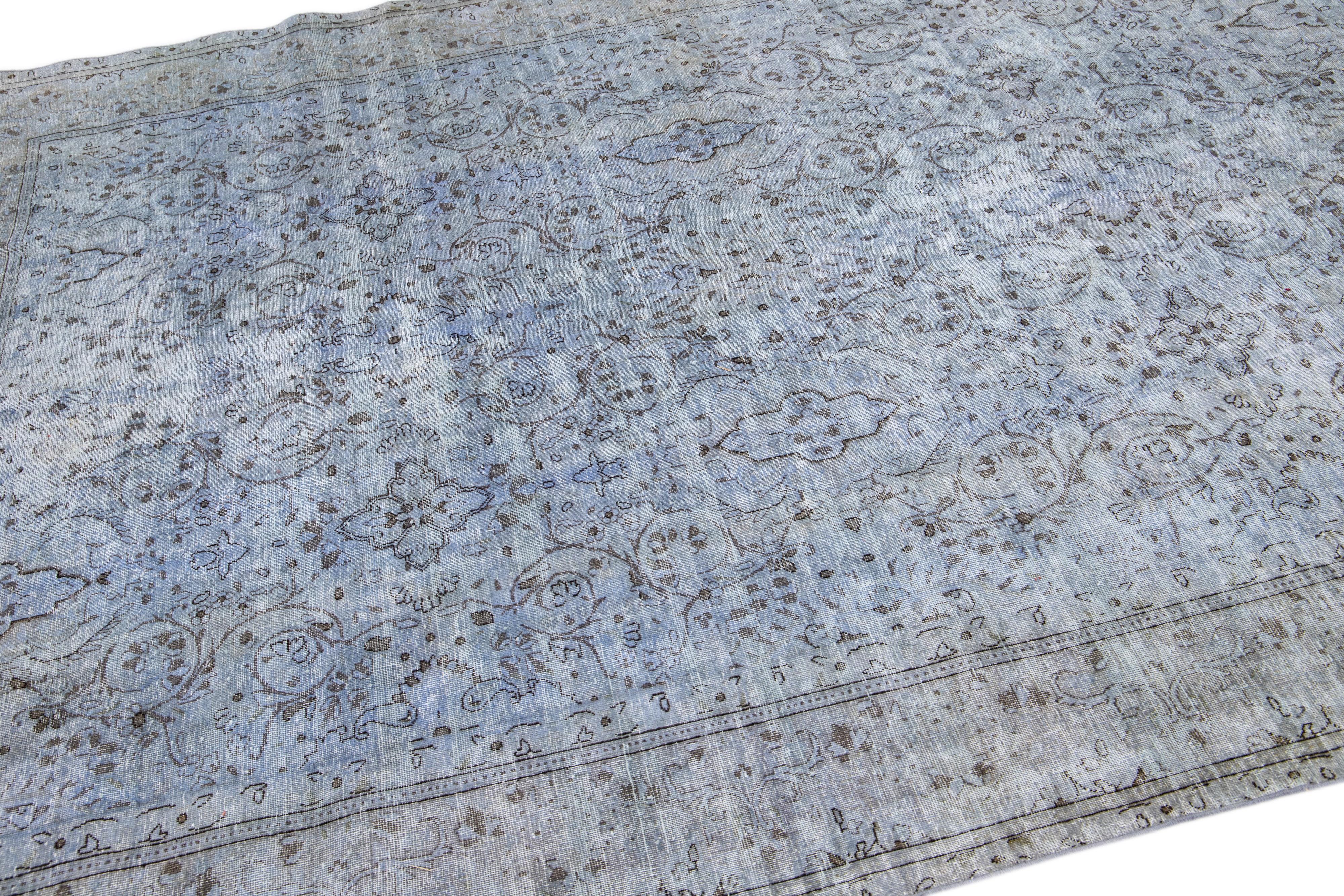 Vintage Persian Overdyed Handmade Floral Blue Wool Rug For Sale 1