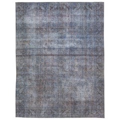 Tappeto vintage persiano sovratinto fatto a mano in lana blu floreale