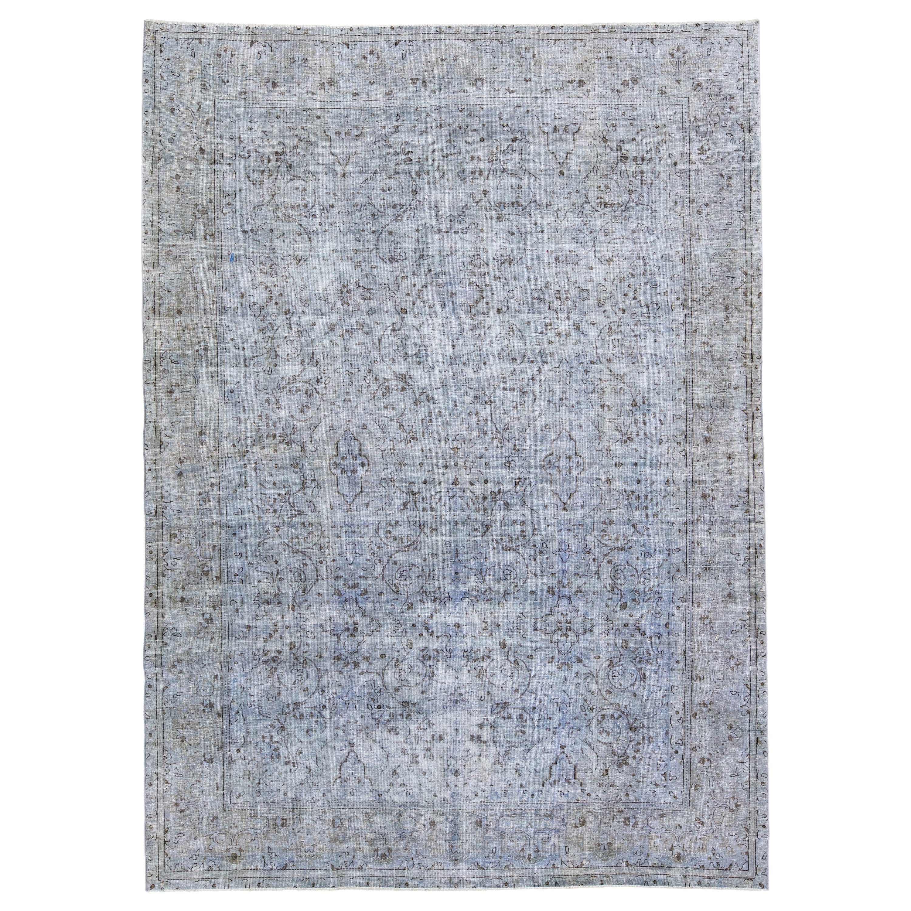 Tappeto vintage persiano sovratinto fatto a mano in lana blu floreale
