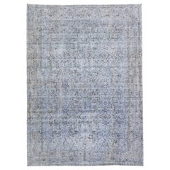 Tappeto vintage persiano sovratinto fatto a mano in lana blu floreale