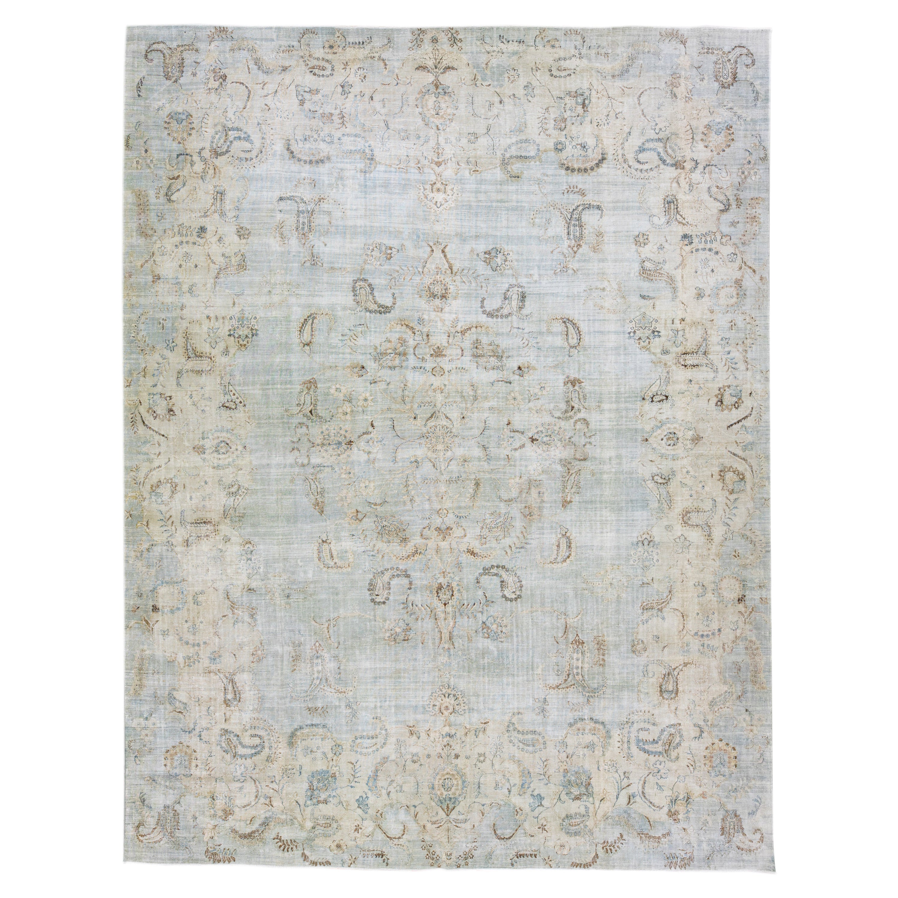 Tappeto vintage persiano sovratinto a mano con medaglione in lana blu in vendita