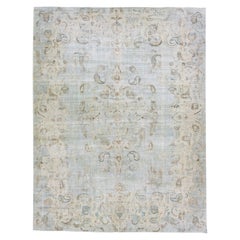 Tappeto vintage persiano sovratinto a mano con medaglione in lana blu