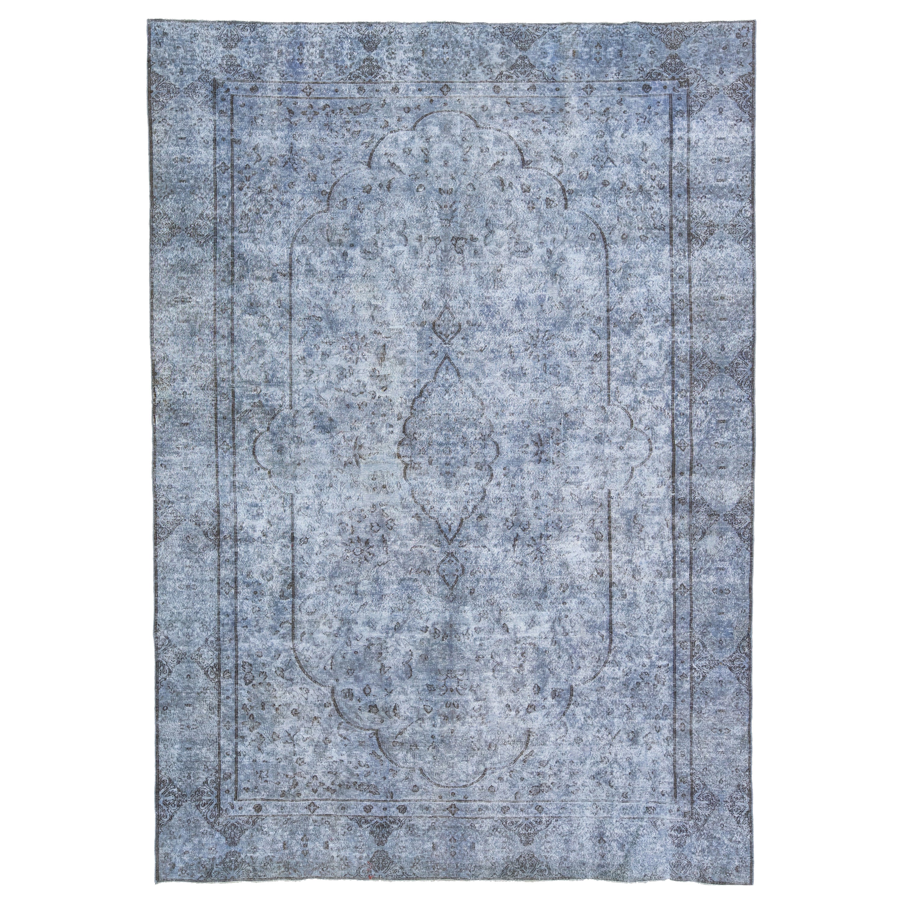 Tappeto vintage persiano sovratinto a mano con medaglione in lana blu