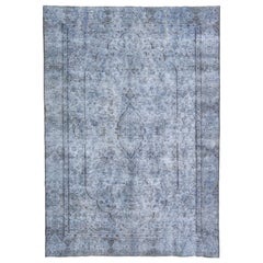 Tappeto vintage persiano sovratinto a mano con medaglione in lana blu