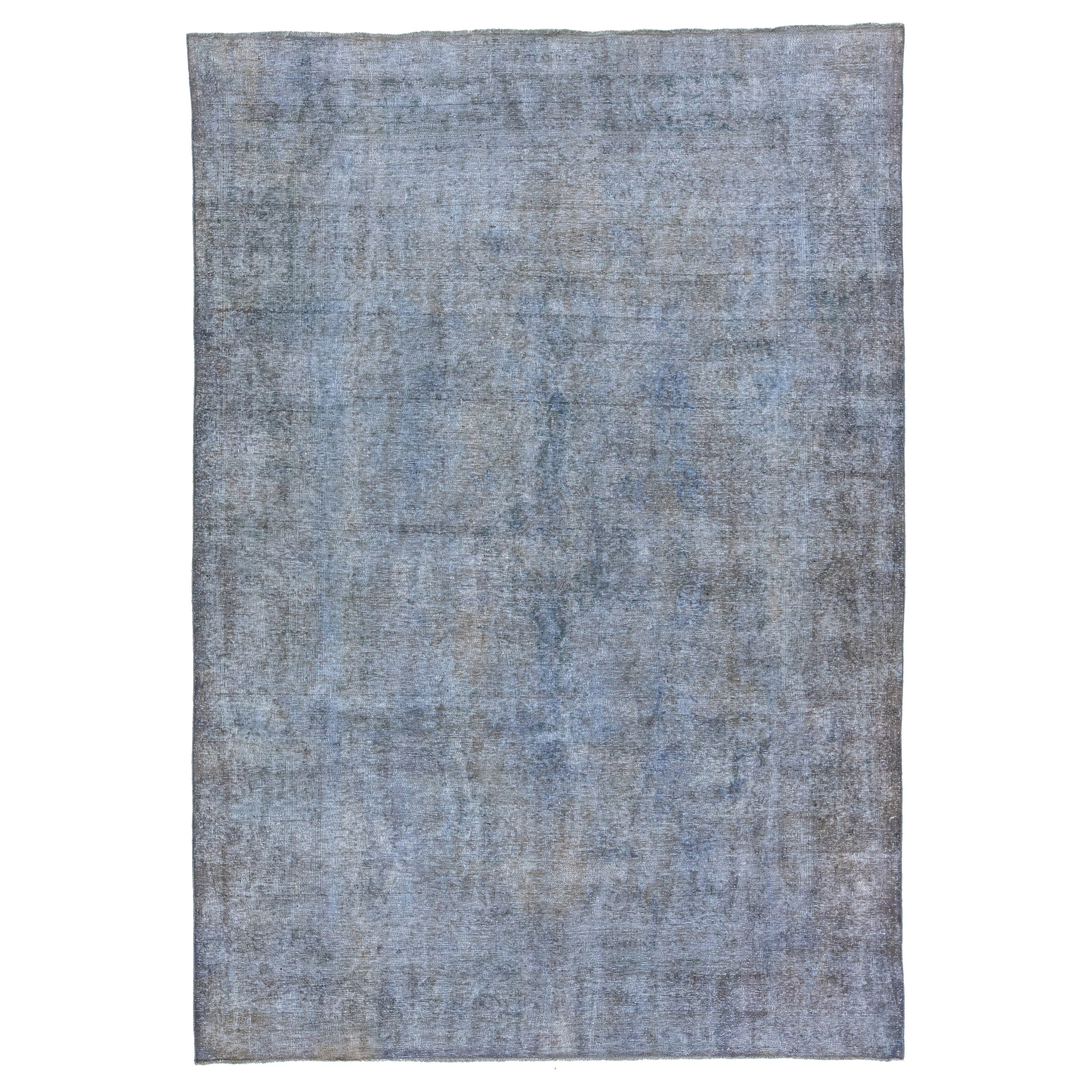 Tappeto vintage persiano sovratinto a mano con medaglione in lana blu