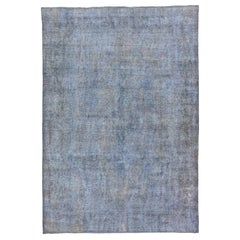 Tappeto vintage persiano sovratinto a mano con medaglione in lana blu