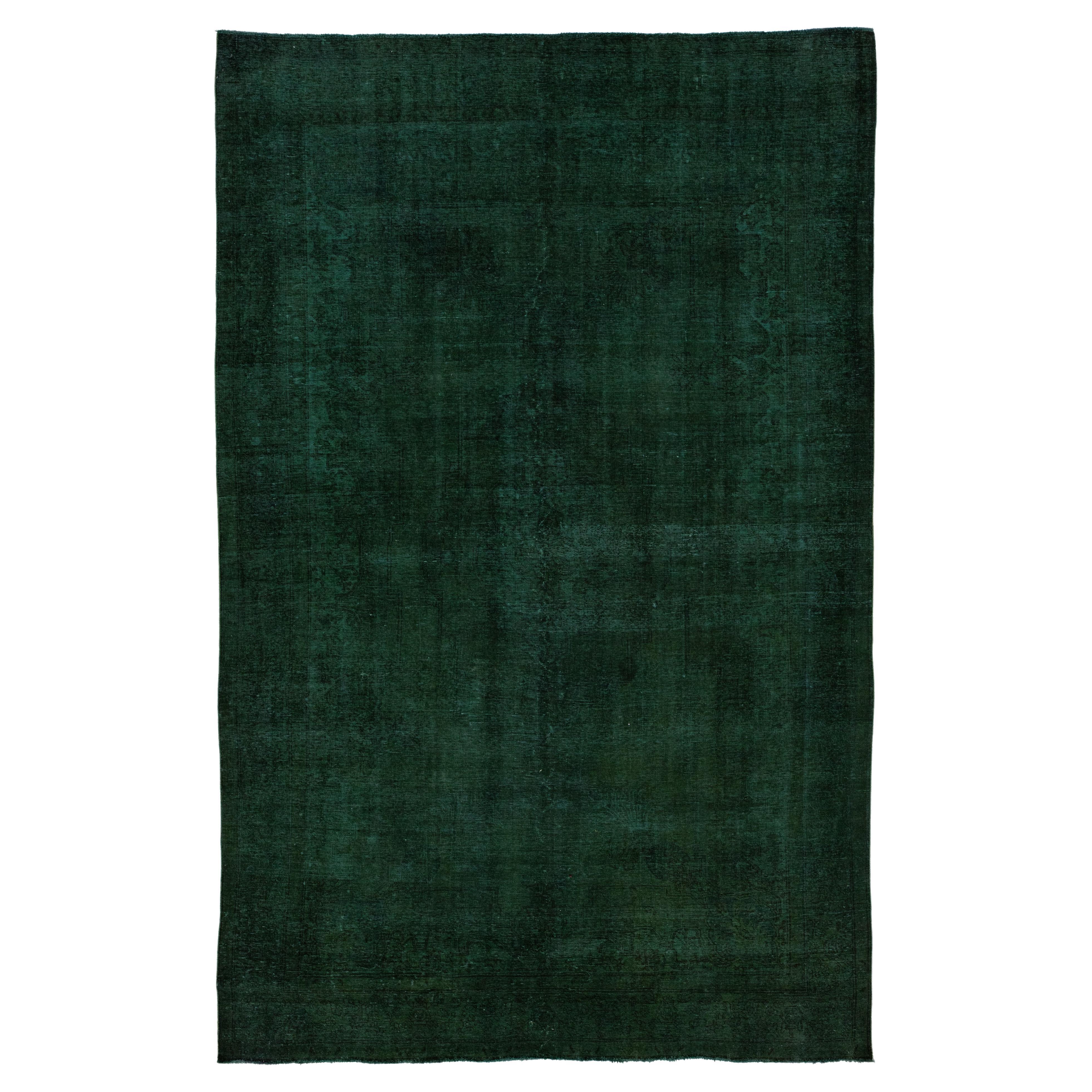 Vintage Persian Overdyed Handmade Wool Rug With Allover Design In Green For Sale