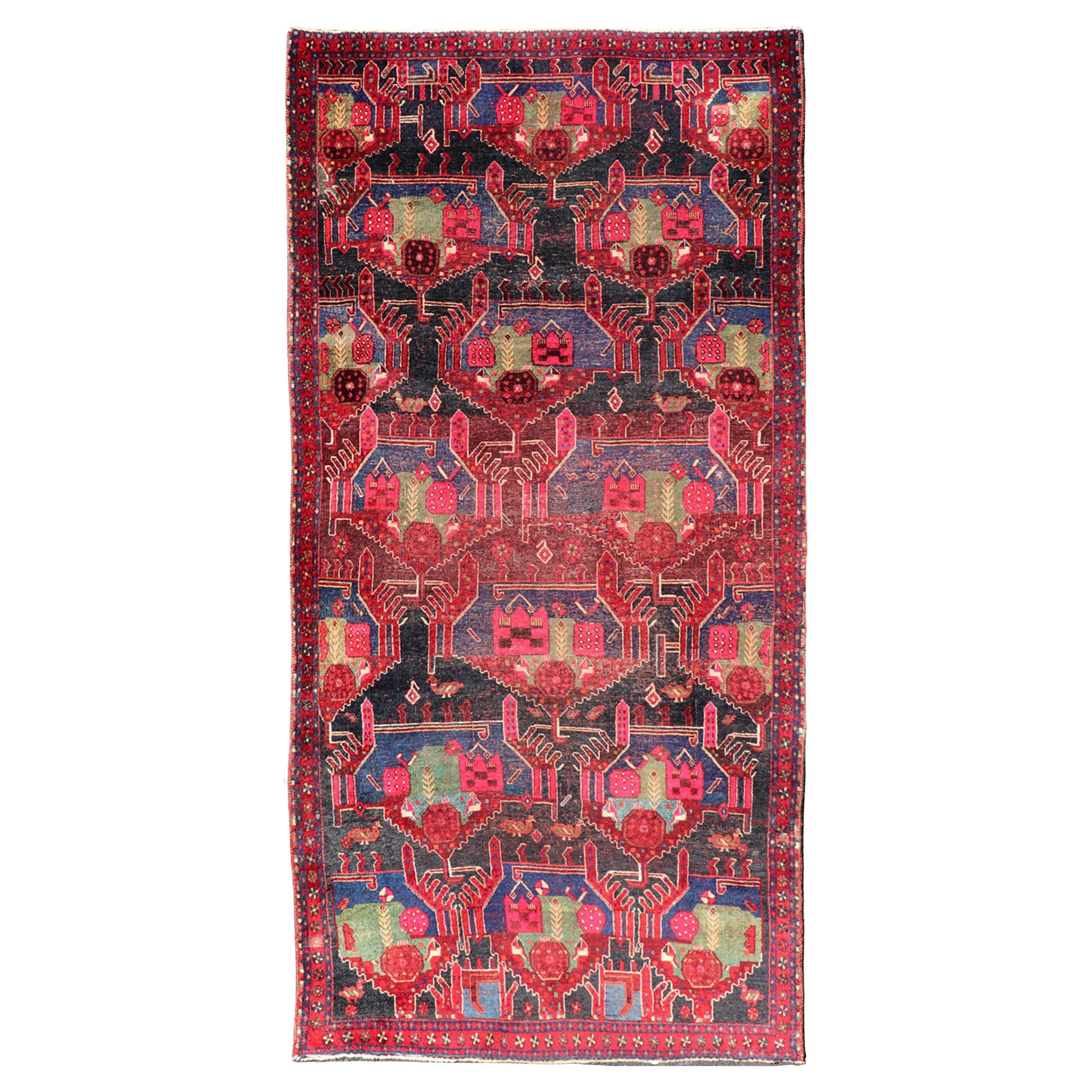 Vintage Persian Qashqai Rug with Vibrant Tribal Motifs 4'6 x 9'8