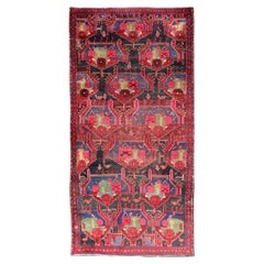 Vintage Persian Qashqai Rug with Vibrant Tribal Motifs 4'6 x 9'8