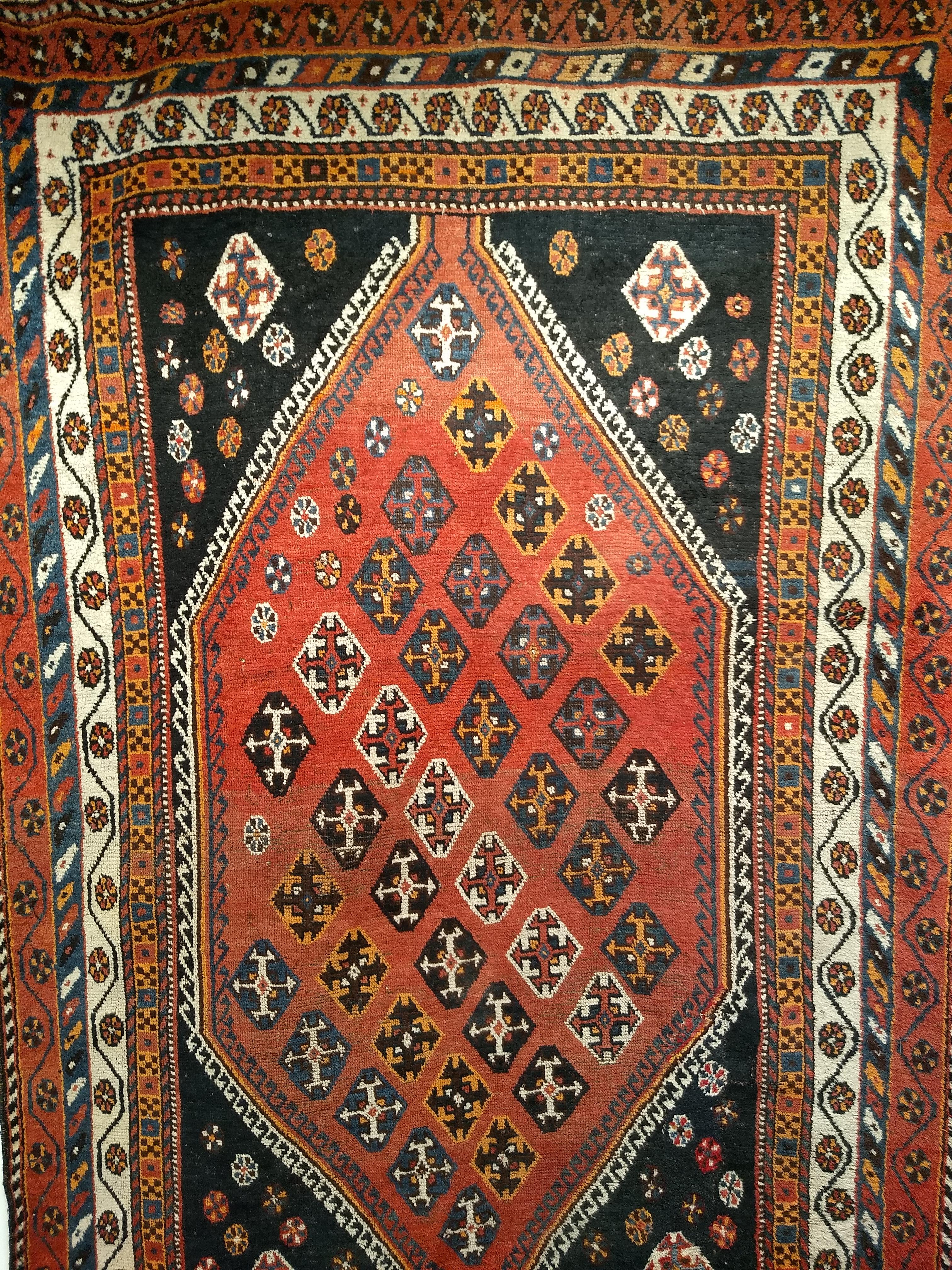 Vegetable Dyed Vintage Persian Qashqai Tribal Area Rug in Rust, Ivory, Blue, Yellow, Black For Sale