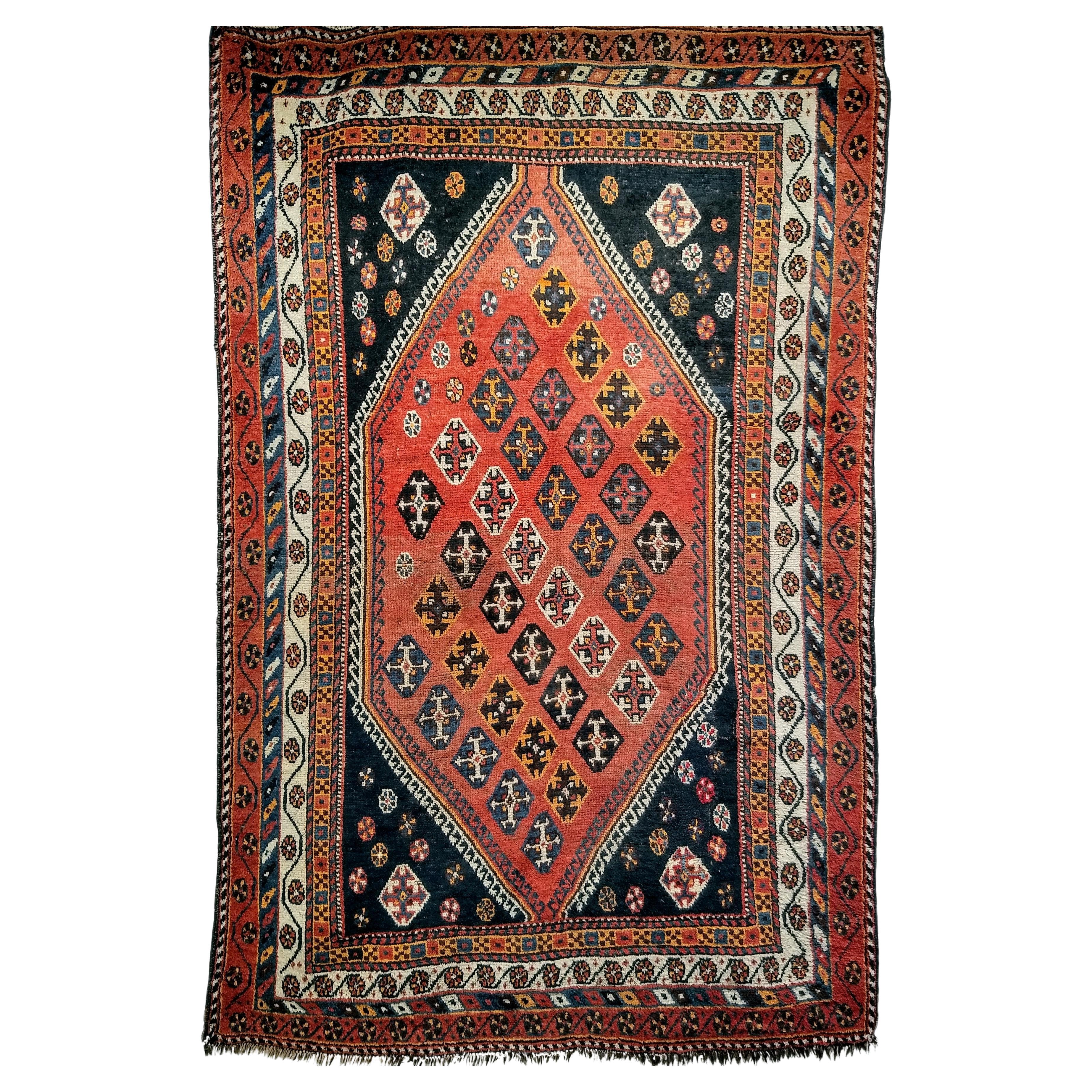 Vintage Persian Qashqai Tribal Area Rug in Rust, Ivory, Blue, Yellow, Black For Sale