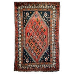 Antique Persian Qashqai Tribal Area Rug in Rust, Ivory, Blue, Yellow, Black