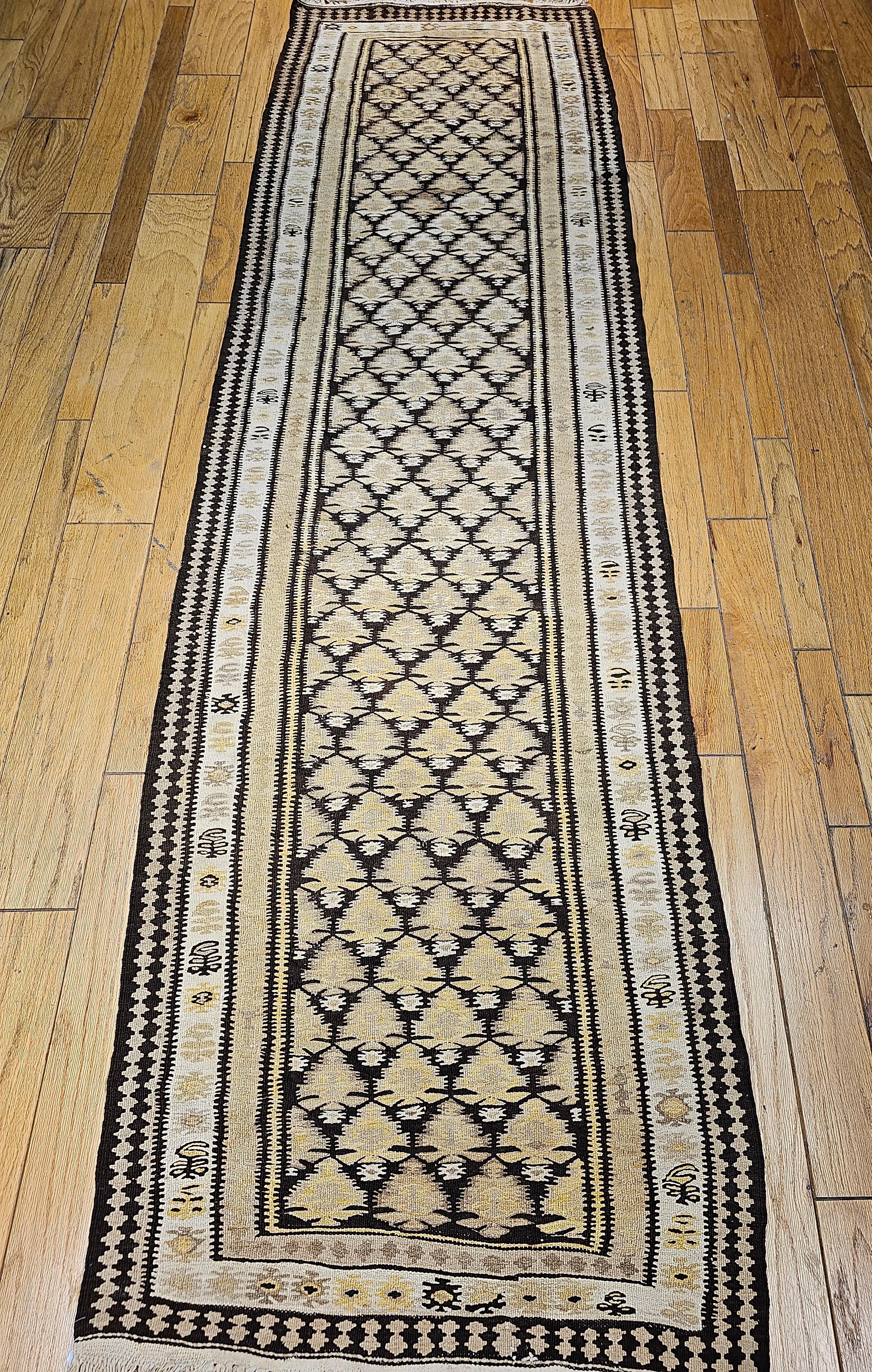 Vintage Persian Kilim (flat woven) runner has a brilliant geometric design and wonderful colors.   Beautiful Persian kilim runner is from the city of Qazvin in central Persia which was a major stop on the ancient Silk Road.   The allover design is a