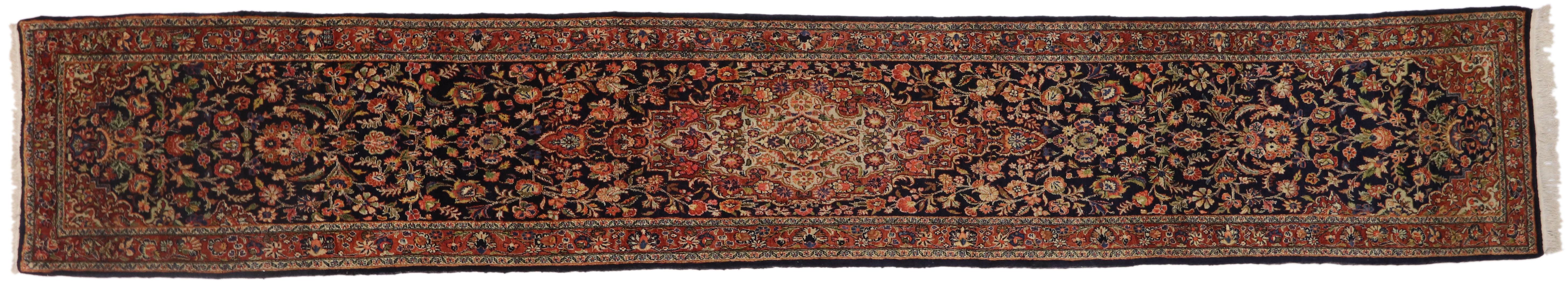 76690, vintage Persian Qazvin runner, extra long hallway runner. This hand-knotted wool vintage Persian Qazvin runner with traditional style features a central medallion with cusped edges and cartouche finials. The centre medallion is surrounded by