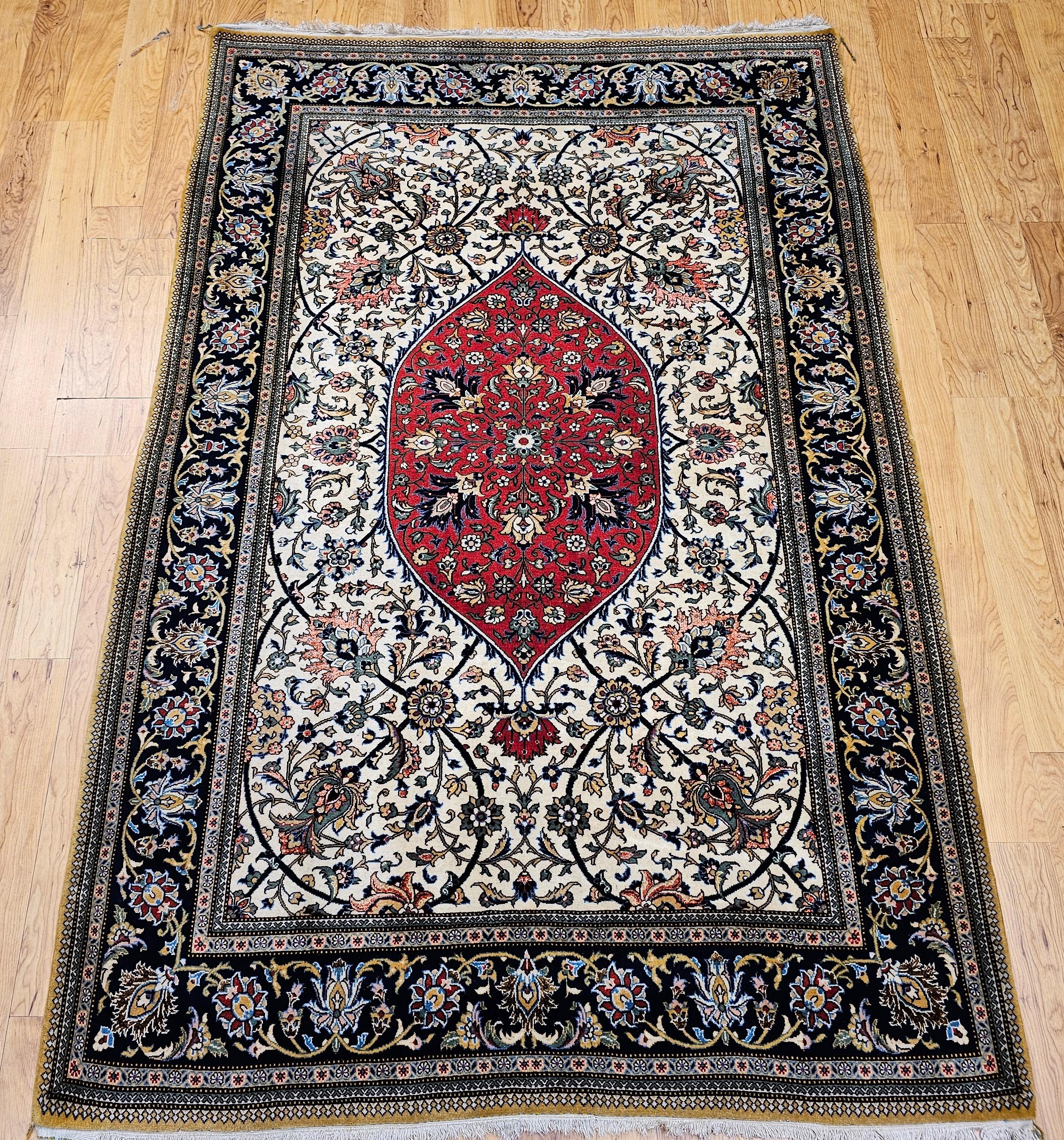 Discover the unparalleled beauty and refined artistry of this Mid-20th Century Vintage Persian Qum Area Rug, meticulously hand-knotted circa the mid-1900s. This exceptional rug is a testament to the supreme craftsmanship for which Qum rugs are