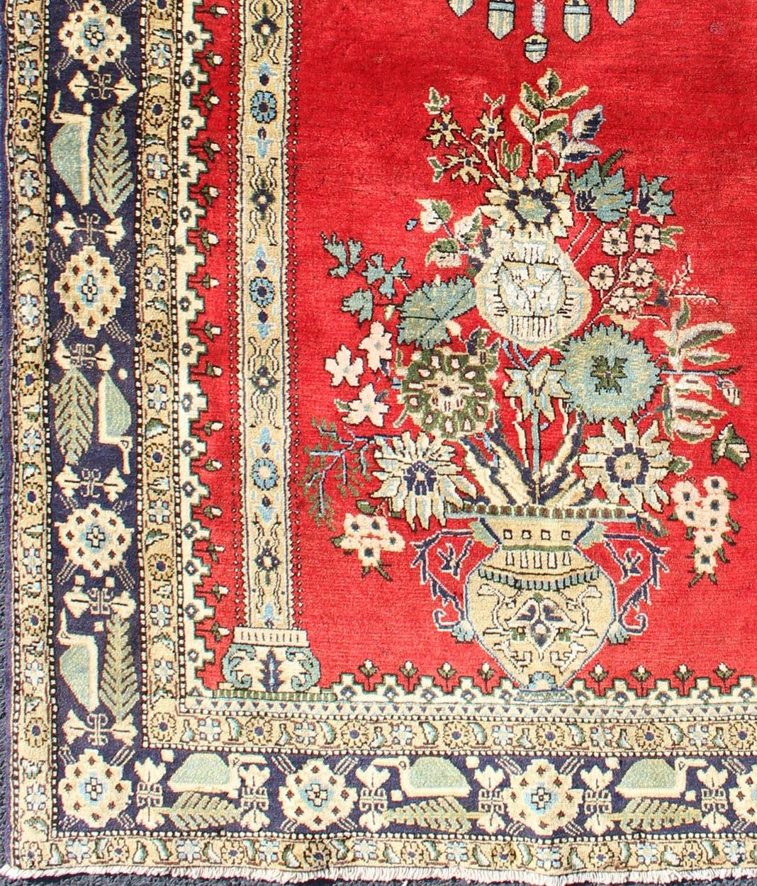 Vintage Persian Qum prayer rug with bright red field and floral bouquet chandelier Design, rug h-310-18, country of origin / type: Iran / Qum, circa 1950

This beautiful vintage Persian Qum rug bears a prayer rug design and a flower bouquet