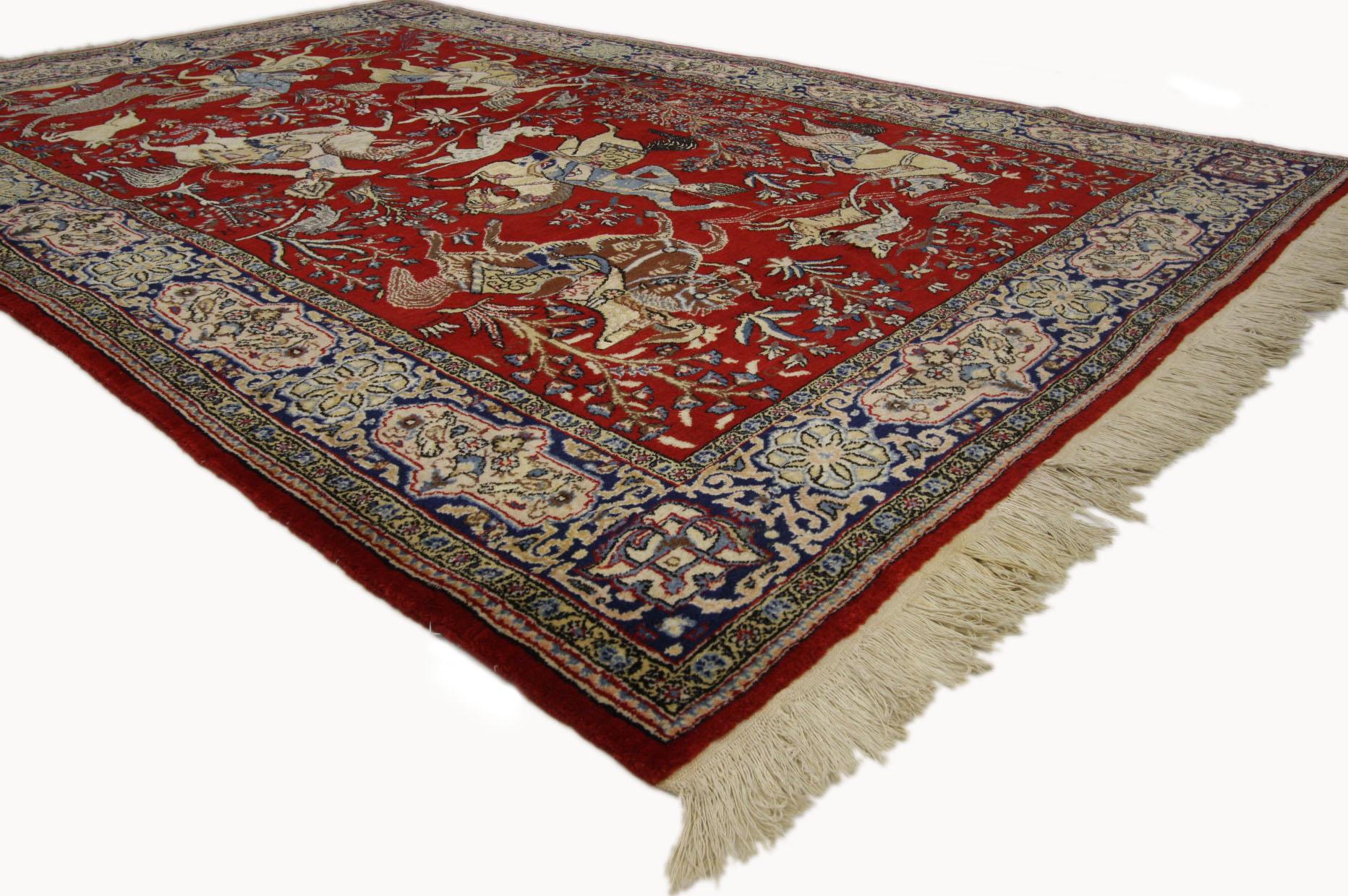 74209 Vintage Persian Qum Pictorial Rug, Medieval Style Tapestry, Hunting Carpet. This hand knotted wool vintage Persian Qum rug features a medieval style depicting a lively pictorial hunting scene against a ruby red backdrop. The sense of flight is