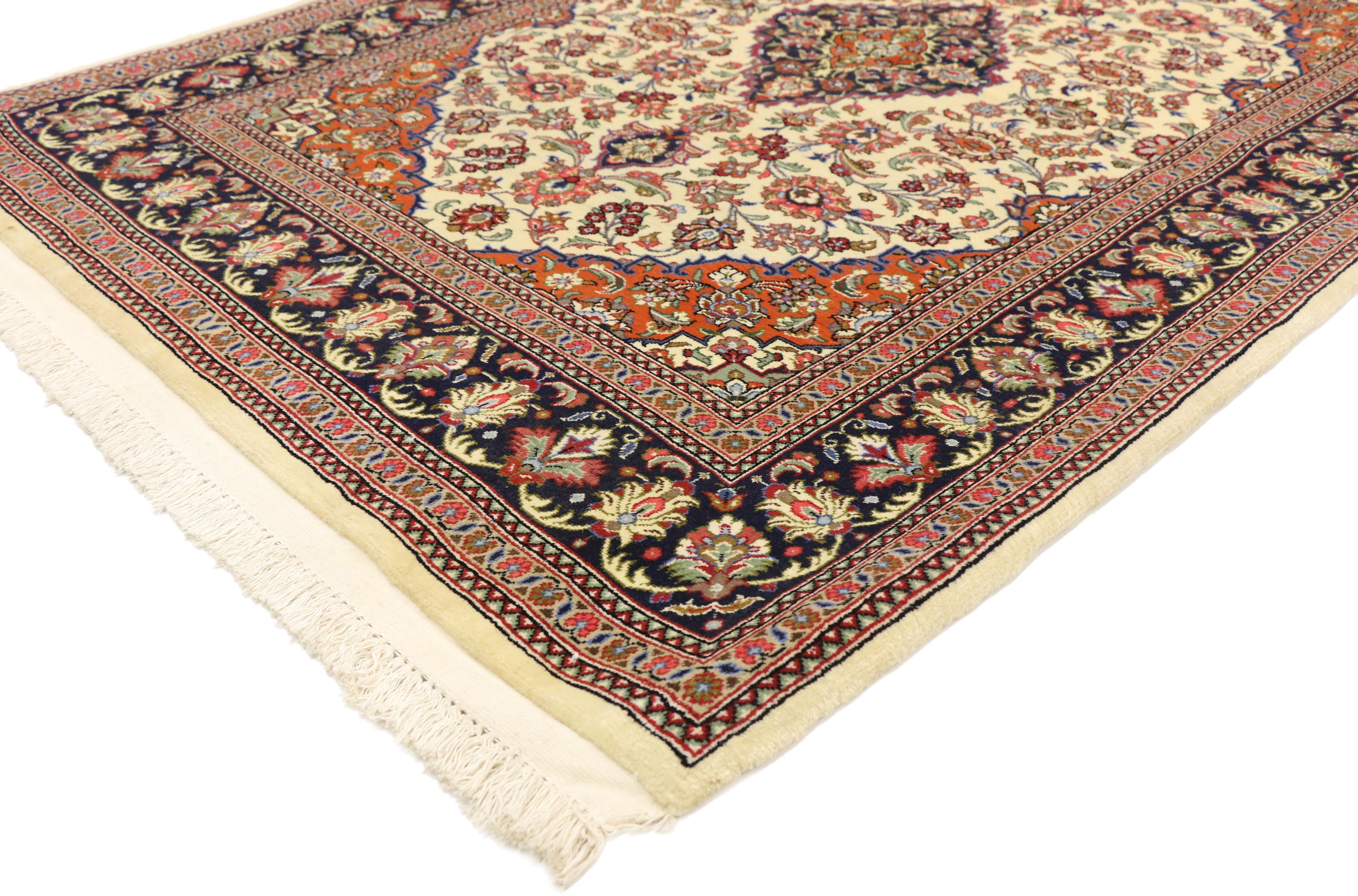 74586 Vintage Persian Qum Silk Rug with with French Rococo Style. This vintage Persian Qum silk rug with traditional style features a centre medallion and elaborate spandrels with an all-over pattern surrounded by a classic border creating a