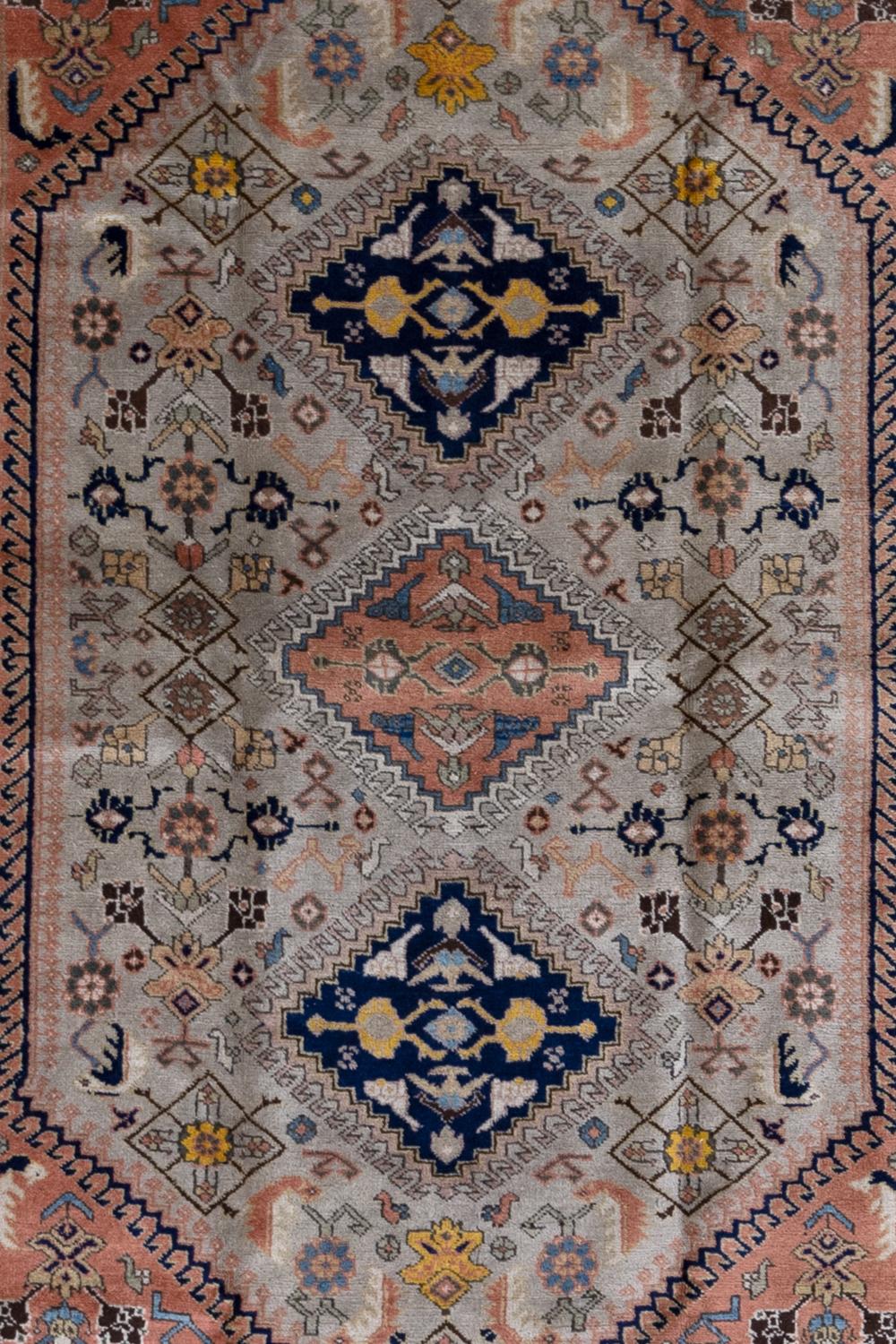 Age: Circa 1930

Pile: full, original 

Wear Notes: 2

Material: wool on cotton

Vintage rugs are made by hand over the course of months, sometimes years. Their imperfections and wear are evidence of the hard working human hands that made