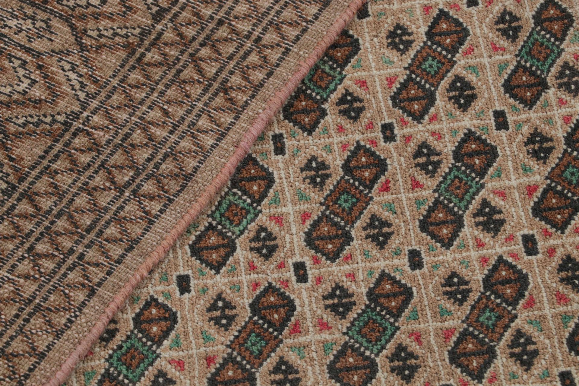 Vintage Persian rug in Beige-Brown Patterns by Rug & Kilim For Sale 1