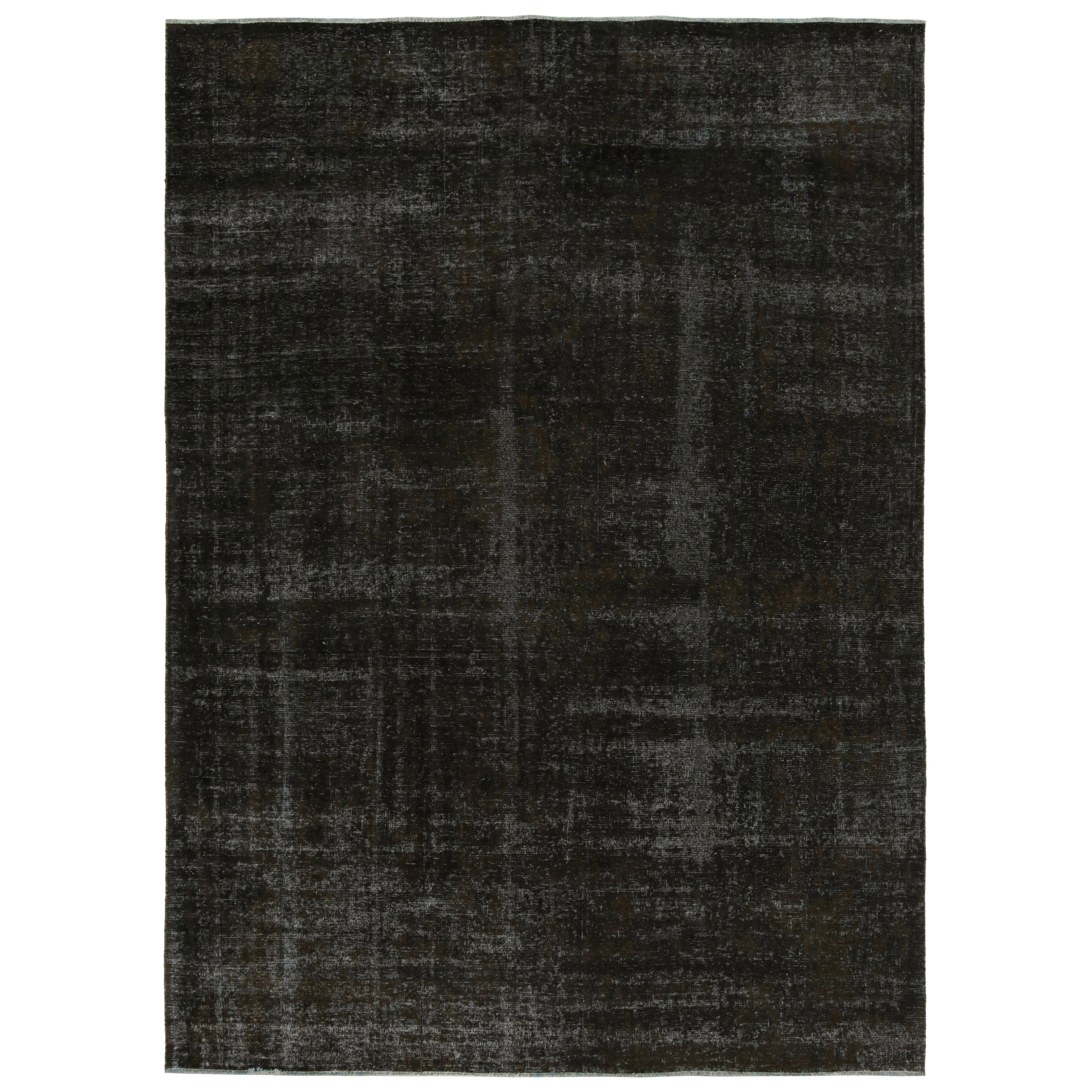 Tappeto persiano vintage con toni neri e marroni, da Rug & Kilim