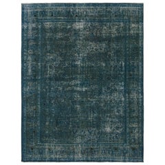 Vintage-Perserteppich mit blauen Blumenmustern, von Rug & Kilim