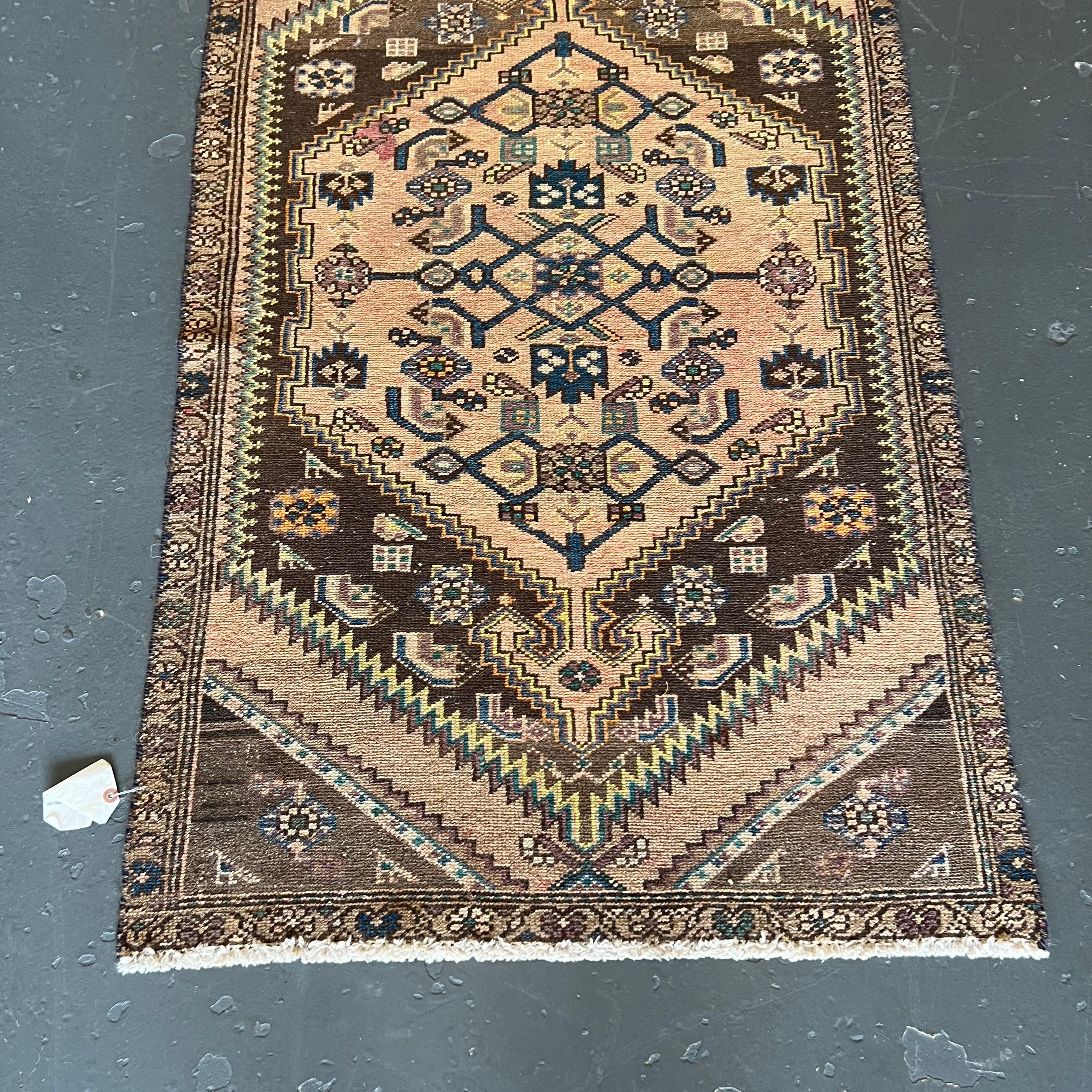 Vintage Persian hand woven runner / rug - measures 2’10 x 9’6.