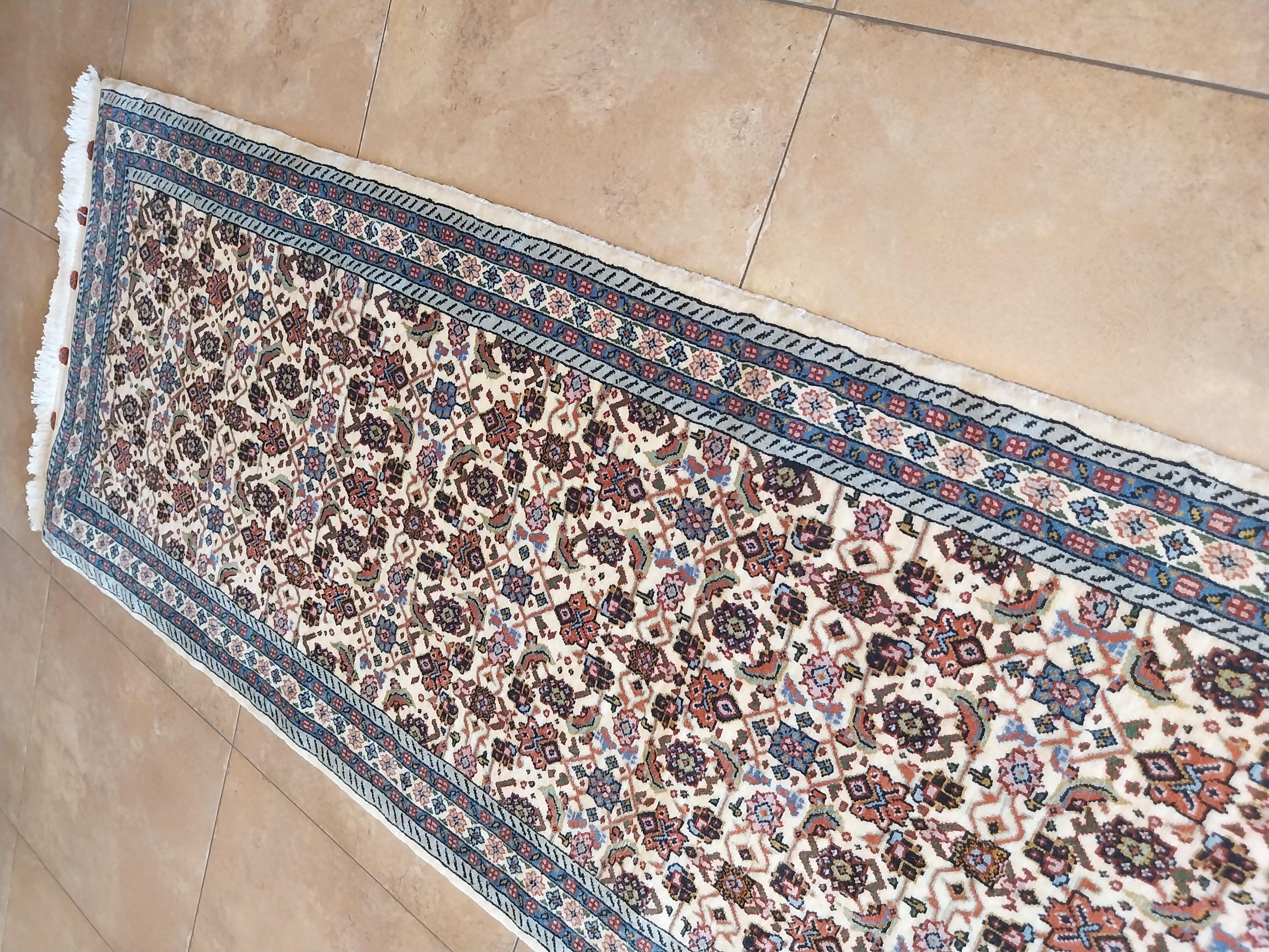 Vintage Persian Runner Mood
Persian runner Mood vintage.
Fully, hand-knotted is a pure form of uncanny beauty. Featuring one of the most beautiful tribal designs and vibrant colors. This splendid example of vintage mood lives with a charm all its