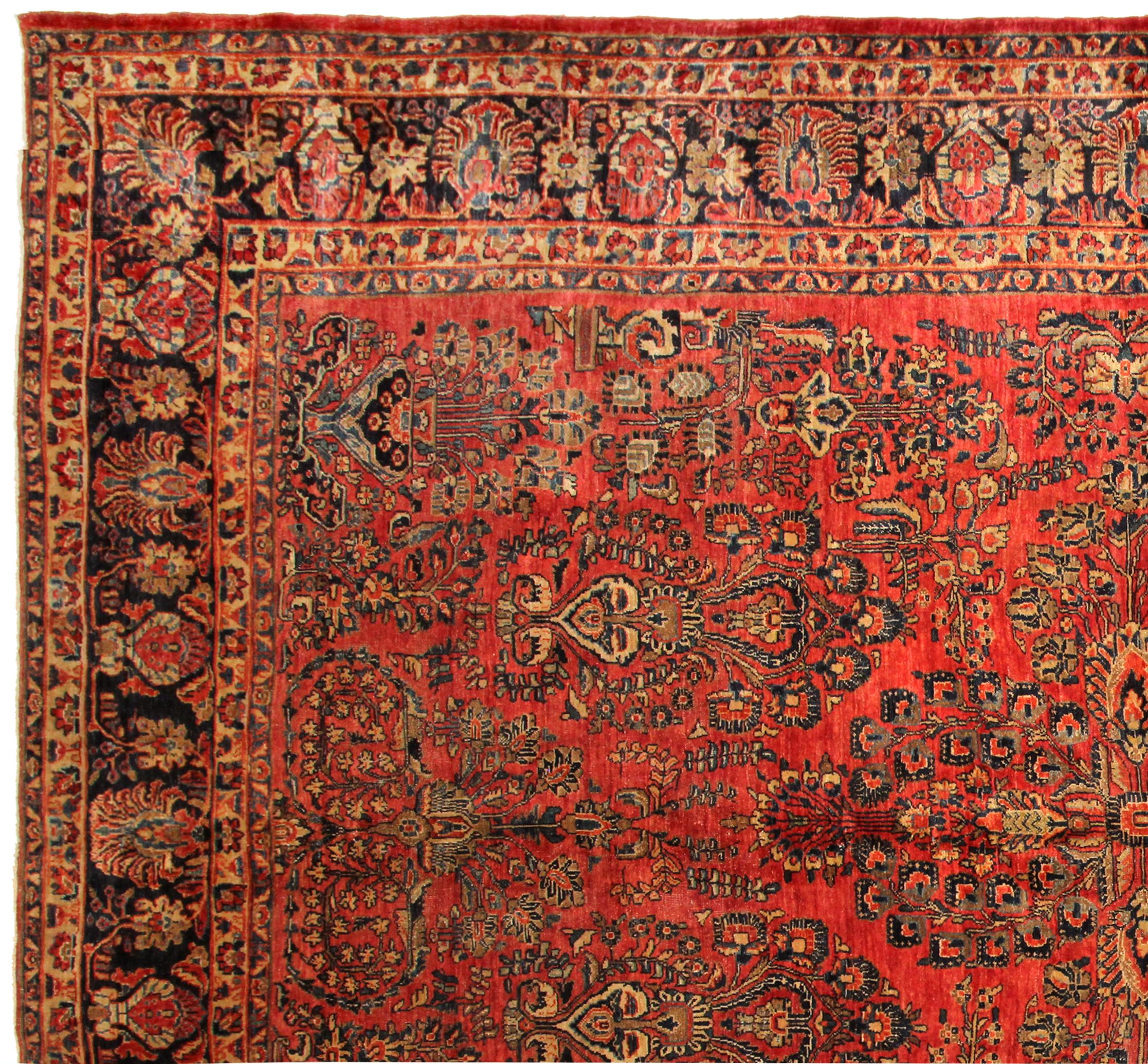 Alfombra oriental persa vintage Sarouk, en tamaño de habitación, con intrincado diseño floral principios del siglo XX en venta