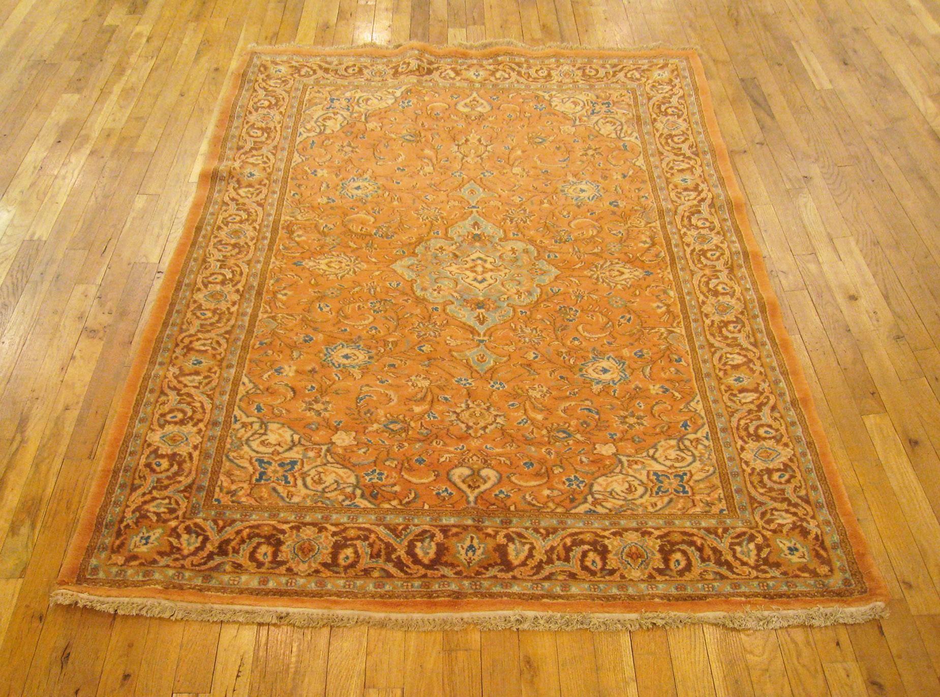Vintage Persian Sarouk Oriental rug, circa 1950, Small size

A vintage Persian Sarouk oriental rug, size 6'8
