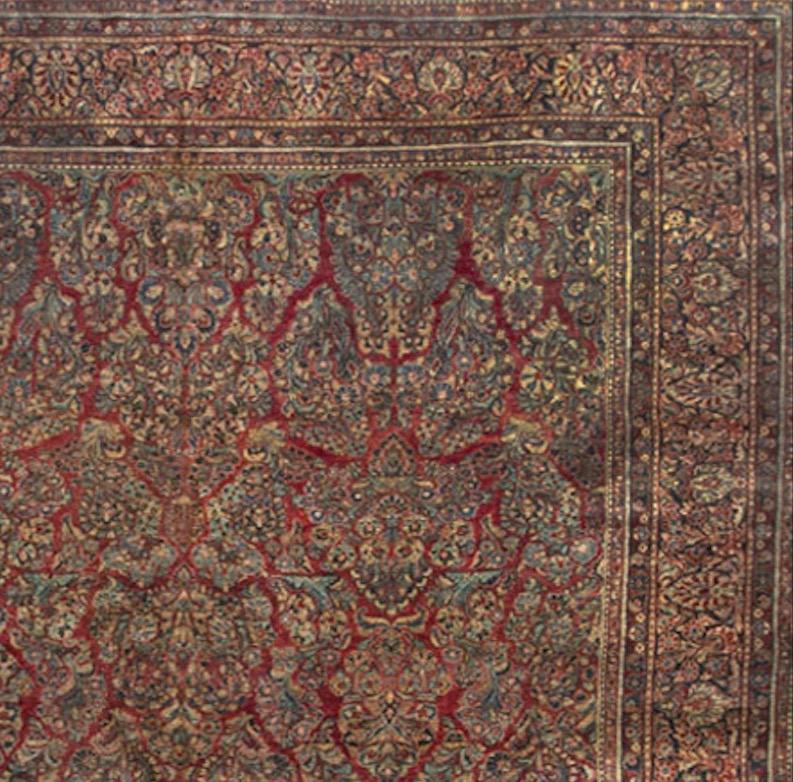 Superb large flower designs fill the main field in this lovely example of the weaving art. The borders and guard borders complete the floral theme to create this impressive piece. Sarouk rugs are from the village of Saruk about 25 miles north of