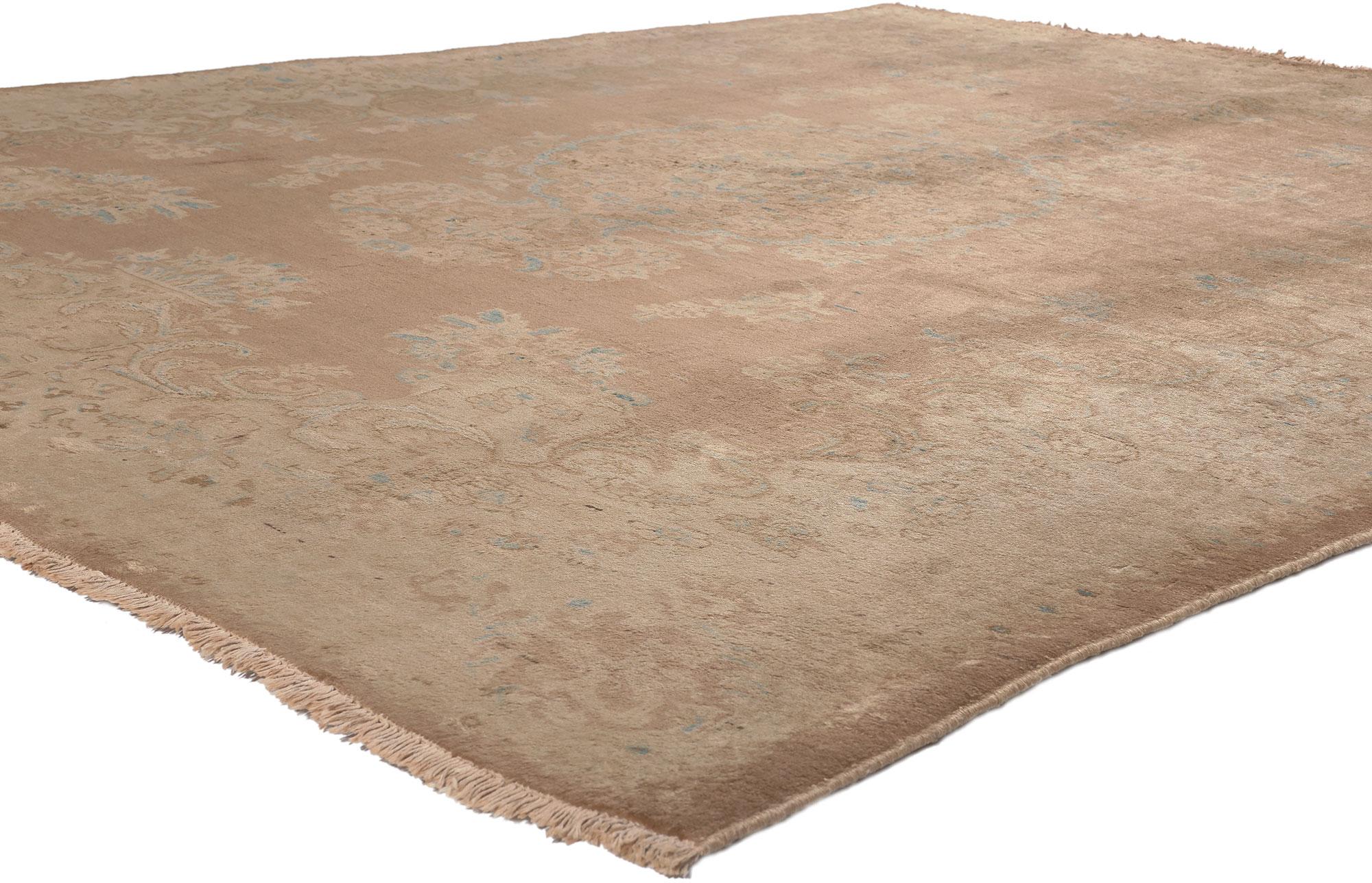 75606 Vintage Persian Sarouk Rug with Earth-Tone Colors, 07’06 x 09’02.
Earth-tone elegance meets soft and subtle in this hand knotted wool vintage Persian Sarouk rug. The floral design and neutral earth-tones woven into this piece work together