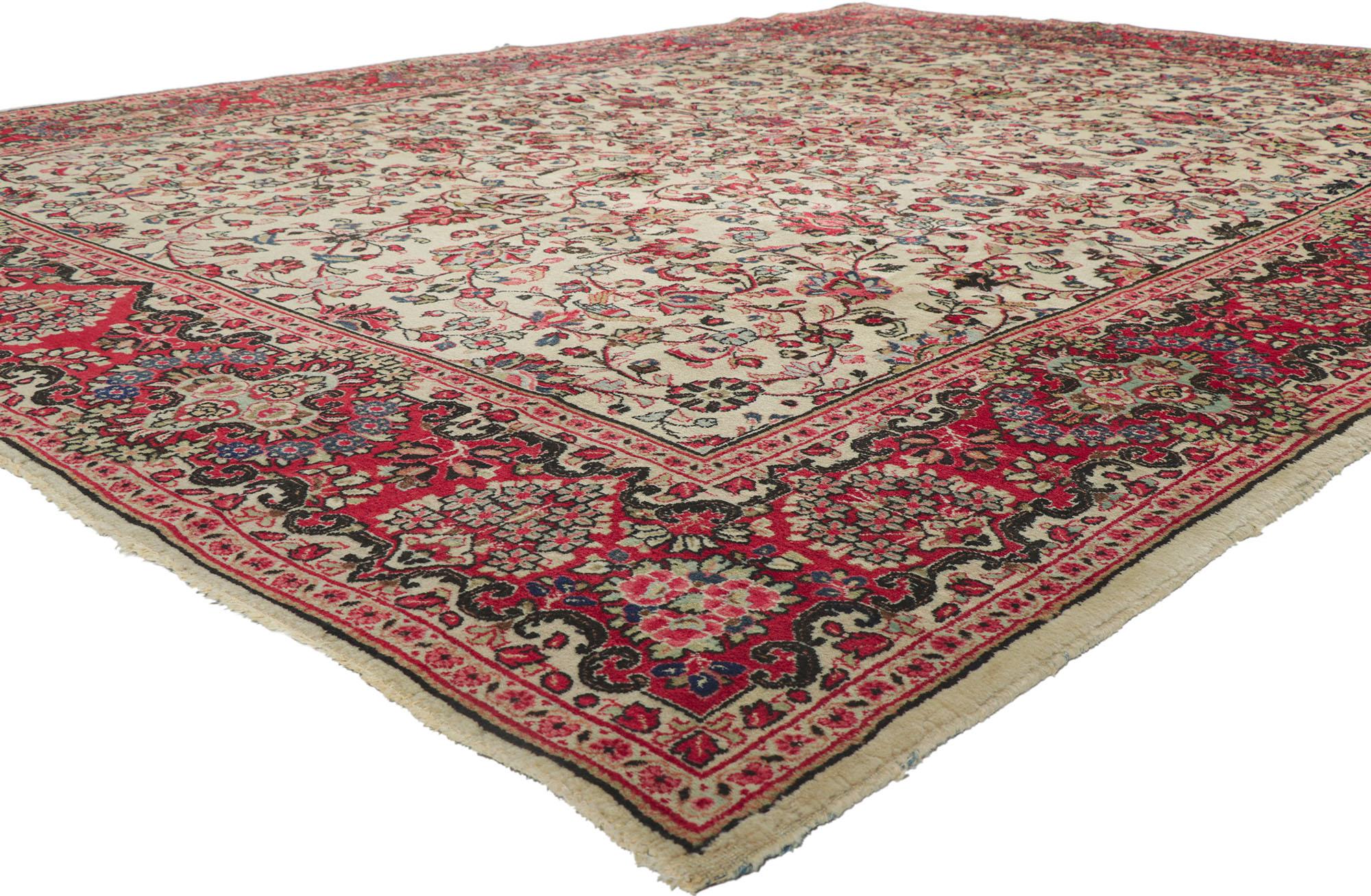 78163 Vintage Persian Sarouk Rug, 09'04 x 12'03.

Step into a harmonious blend of Neoclassic sophistication and Old World allure with this exquisite hand-knotted wool vintage Persian Sarouk rug. Rooted in the weaving traditions of the renowned