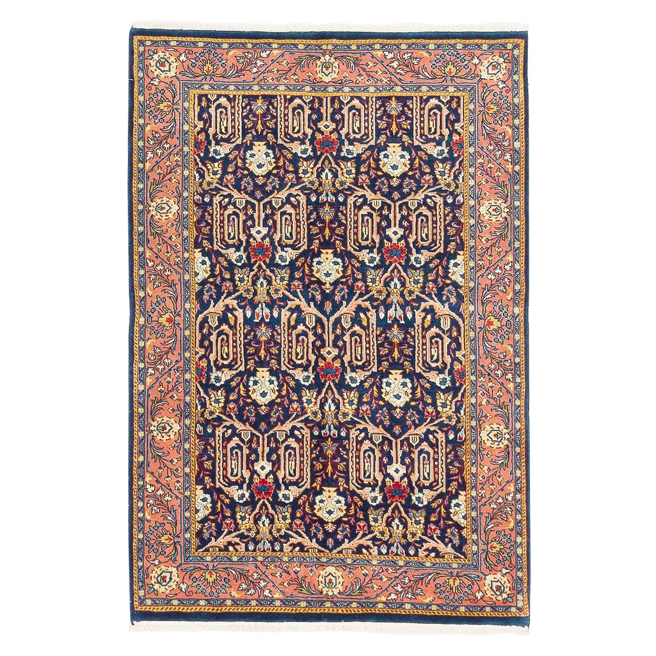 Vintage Persian Sarouk Rug with Colored Botanical Details on Navy Blue Field