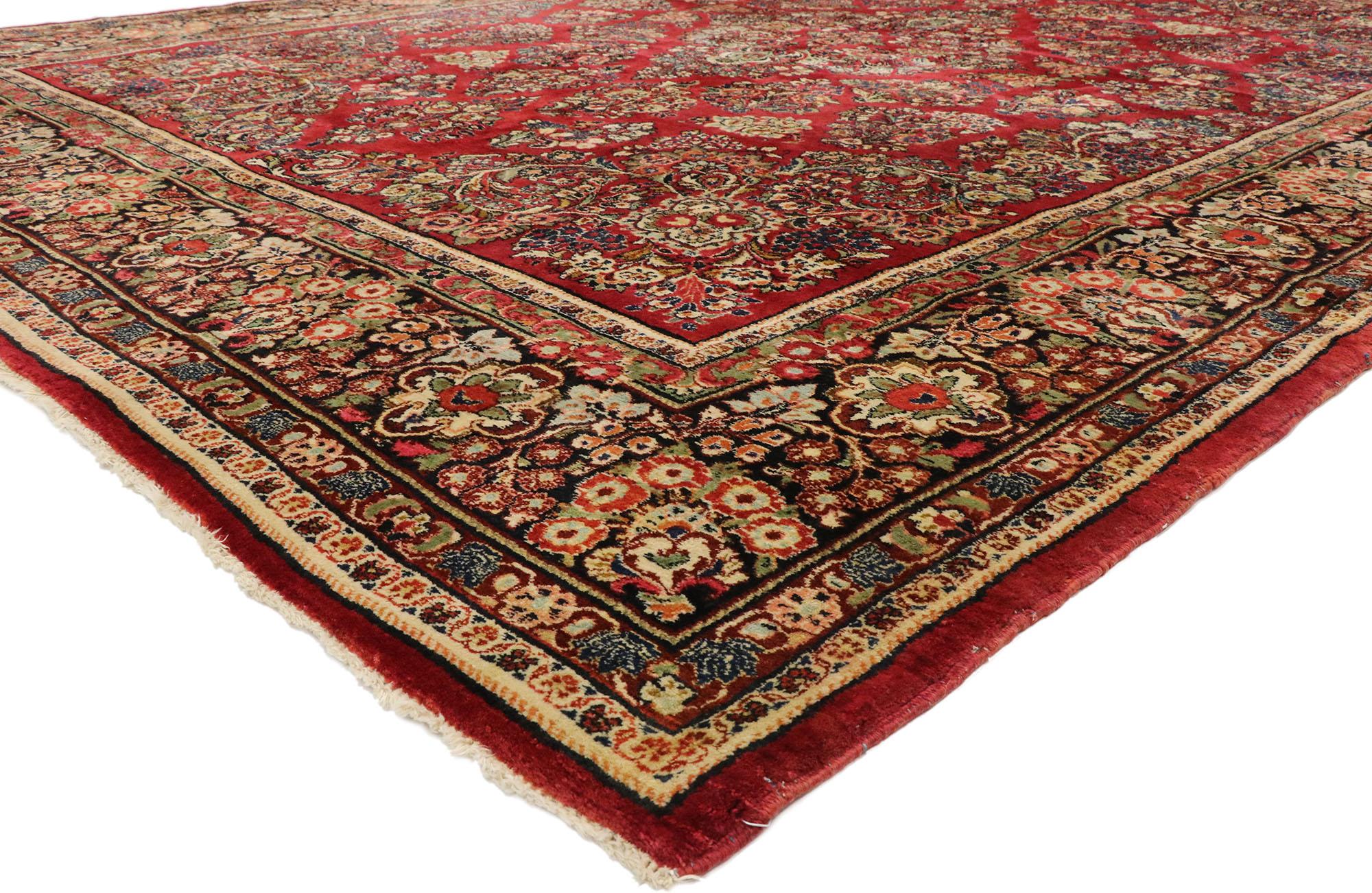 72908, vintage Persian Sarouk rug with traditional English Tudor Manor style 10'01 x 1306.?? With timeless appeal, refined colors, and architectural design elements, this hand knotted wool antique Persian Sarouk rug can beautifully blend modern,