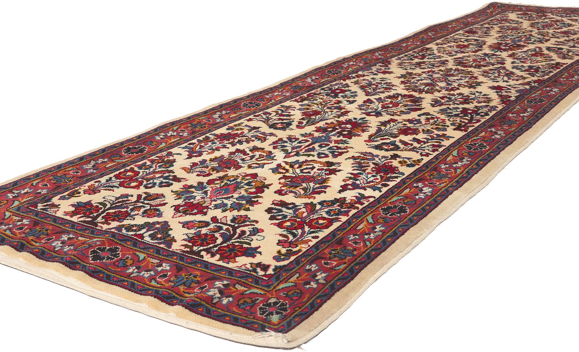 78634 Vintage Persian Sarouk Rug Runner, 02'09 x 09'10.
Stately decadence meets stylish durability in this hand knotted wool vintage Persian Sarouk rug. The naturalistic floral design and traditional color palette woven into this piece work together