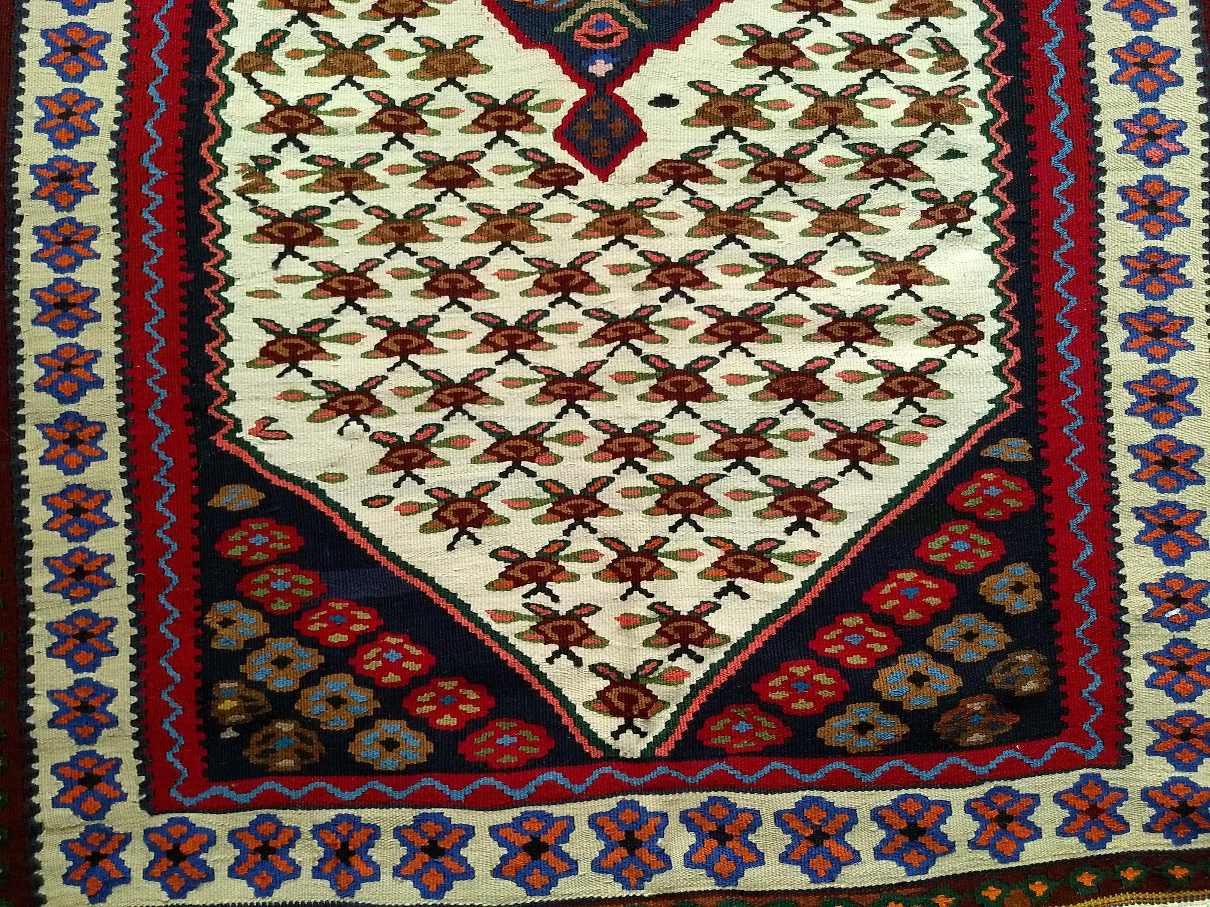 Hand-Knotted Vintage Persian Senneh Kilim Area Rug in Geometric Design in Ivory, Red, Blue For Sale