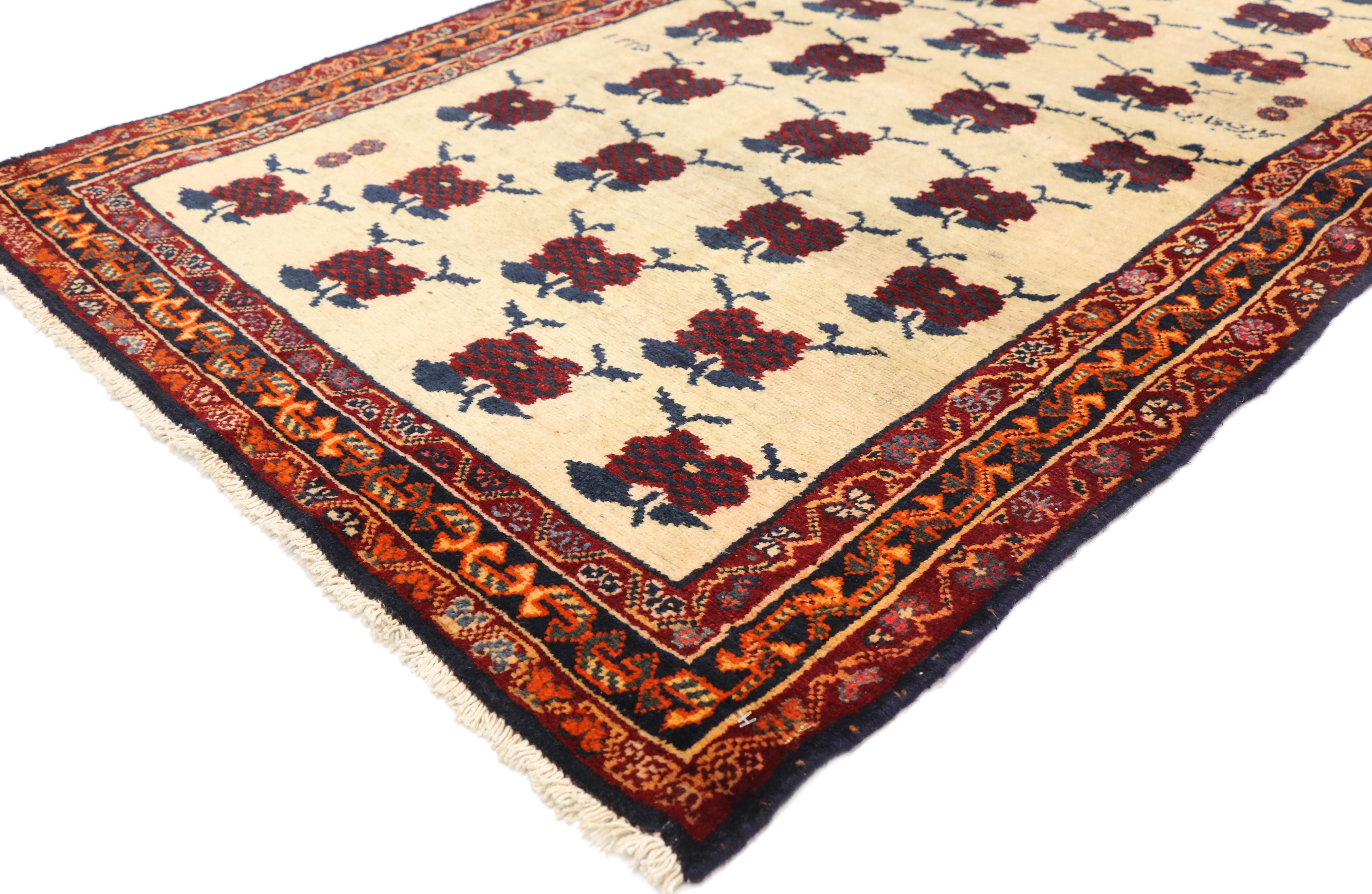 75887, vintage Persian Shiraz Accent rug with Romantic Art Deco style. This hand knotted wool vintage Persian Shiraz accent rug features an all-over abstract floral pattern dotted with a deer and weaver's signature. The vintage Shiraz rug is