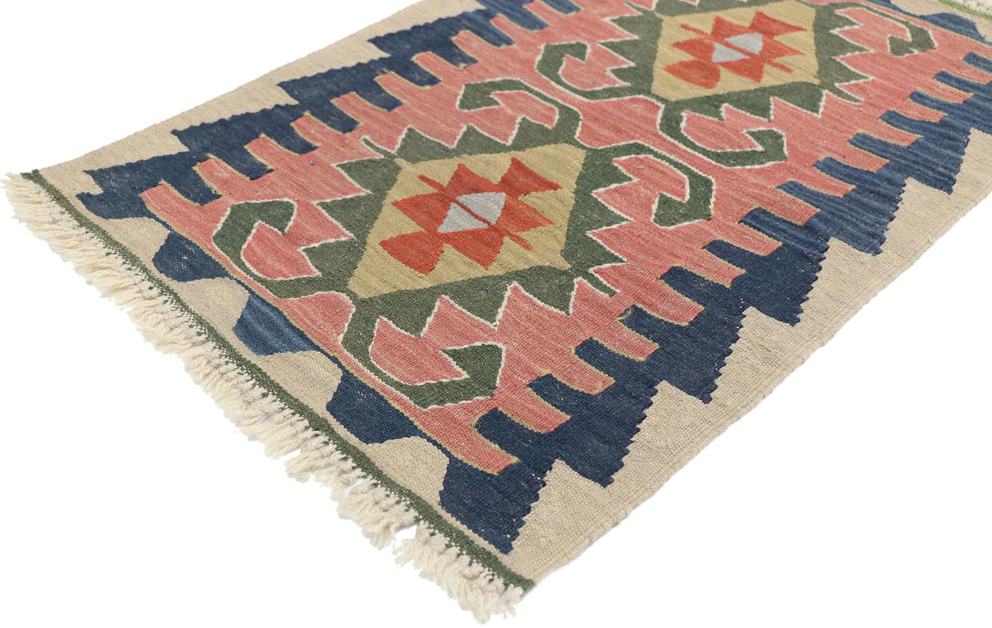 77897, vintage Persian Shiraz Kilim rug with Bohemian Tribal style. Full of tiny details and a bold expressive design combined with vibrant colors and tribal style, this hand-woven wool vintage Persian Shiraz kilim rug is a captivating vision of