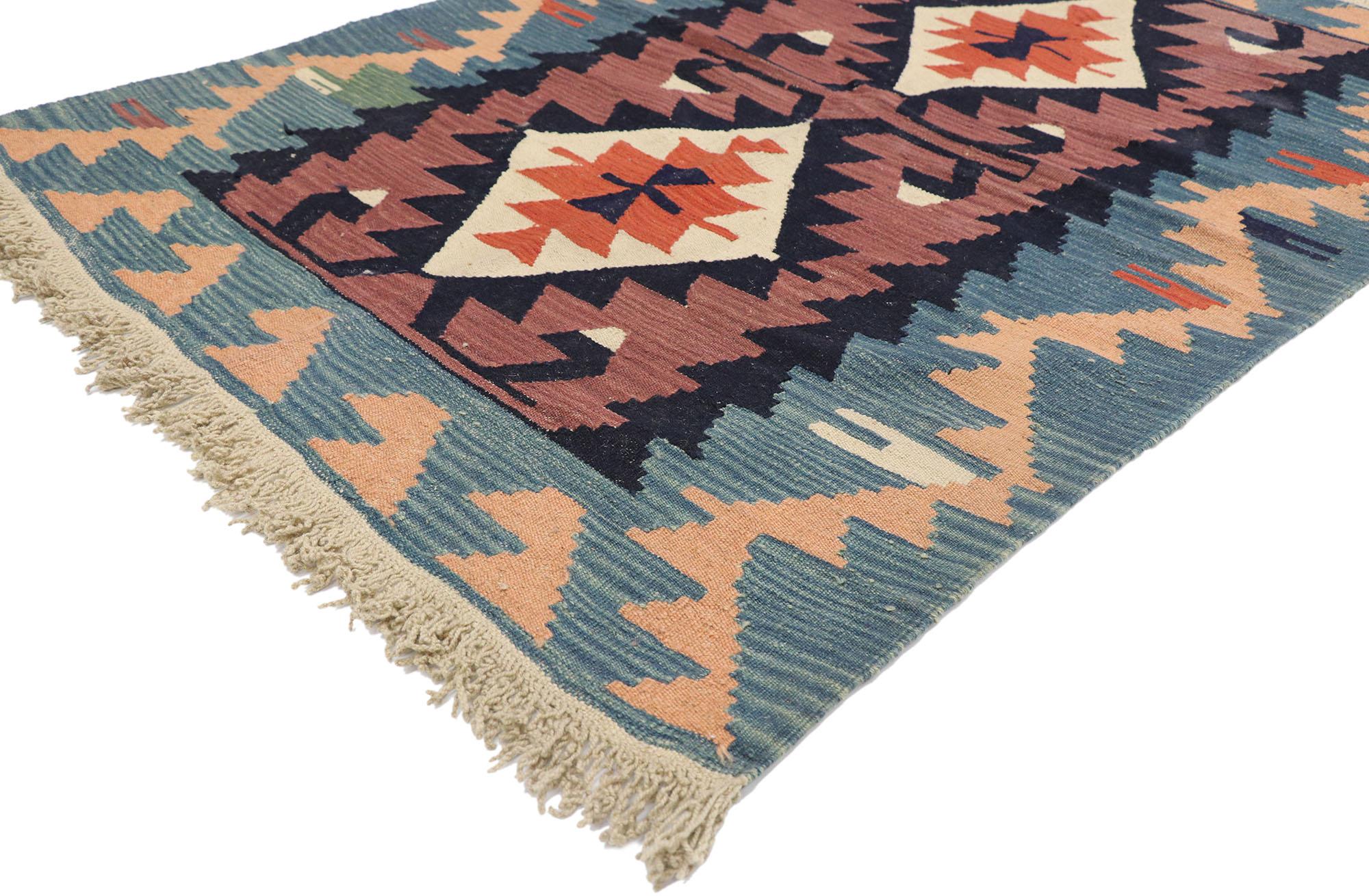 77819, vintage Persian Shiraz Kilim rug with boho chic Tribal style. Full of tiny details and a bold expressive design combined with vibrant colors and tribal style, this hand-woven wool vintage Persian Shiraz kilim rug is a captivating vision of