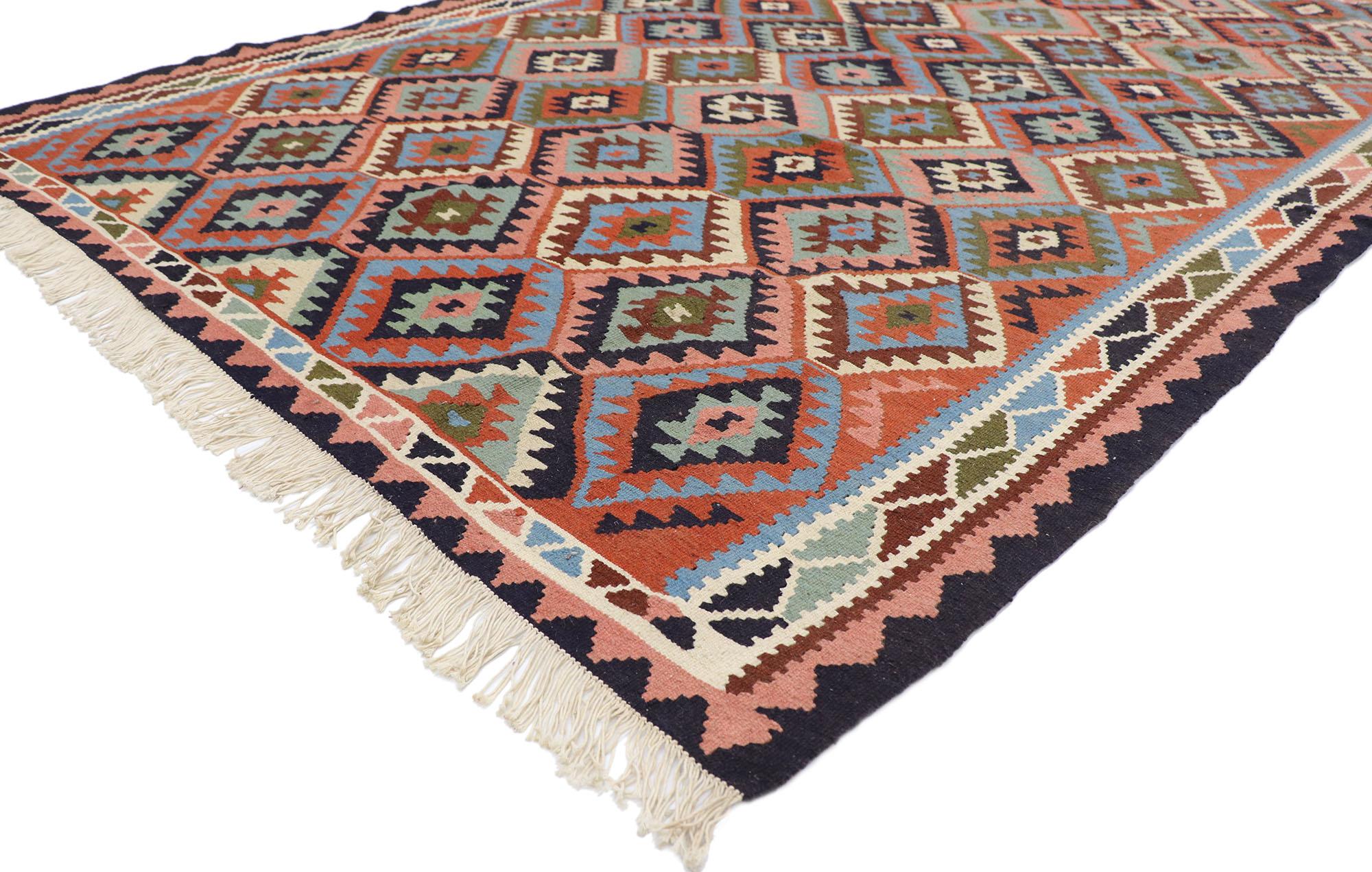 77923 Vintage Persian Shiraz Kilim rug with Southwestern Tribal Style 06'06 x 09'02. Full of tiny details and a bold expressive design combined with vibrant colors and tribal style, this hand-woven wool vintage Persian Shiraz kilim rug is a
