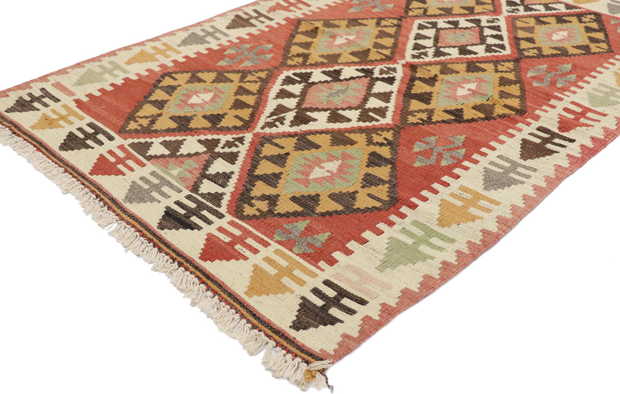 77847 Vintage Persian Shiraz Kilim rug with Southwestern Tribal Style 03'01 x 04'10. Full of tiny details and a bold expressive design combined with vibrant colors and tribal style, this hand-woven wool vintage Persian Shiraz kilim rug is a